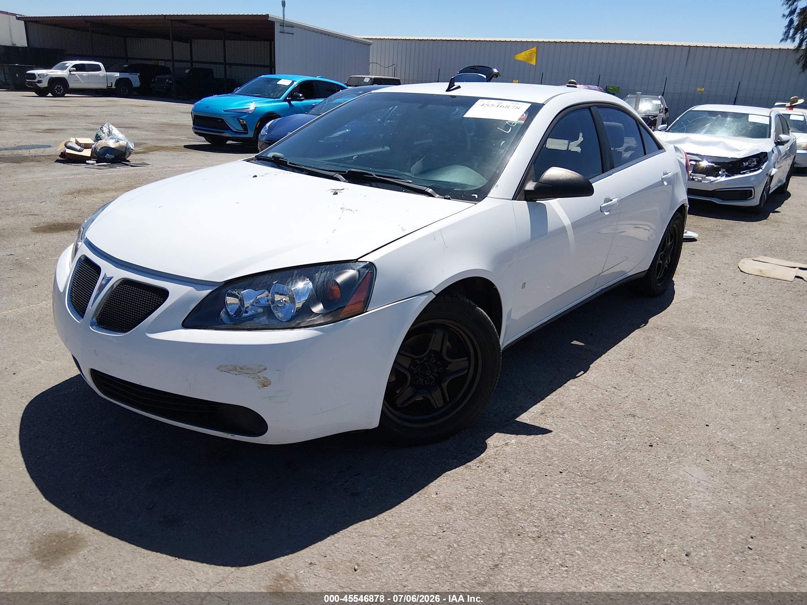 2009 Pontiac G6   White vin: 1G2ZG57BX94176281