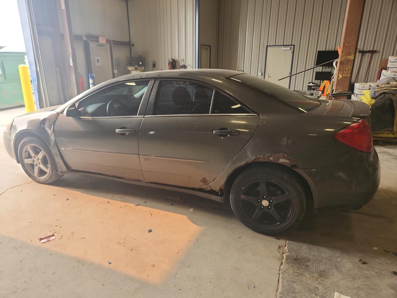 2007 Pontiac G6 Base Charcoal vin: 1G2ZG58N174179821 Damage: Left Rear Door, Rust, 7 To 8 Inches