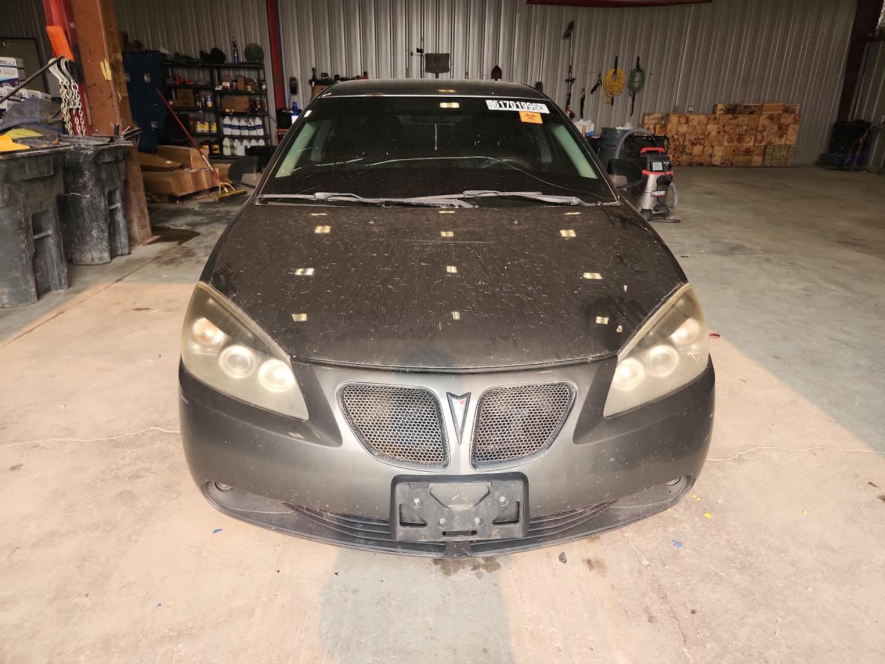 2007 Pontiac G6 Base Charcoal vin: 1G2ZG58N174179821 Damage: Hood, Chipped, 3