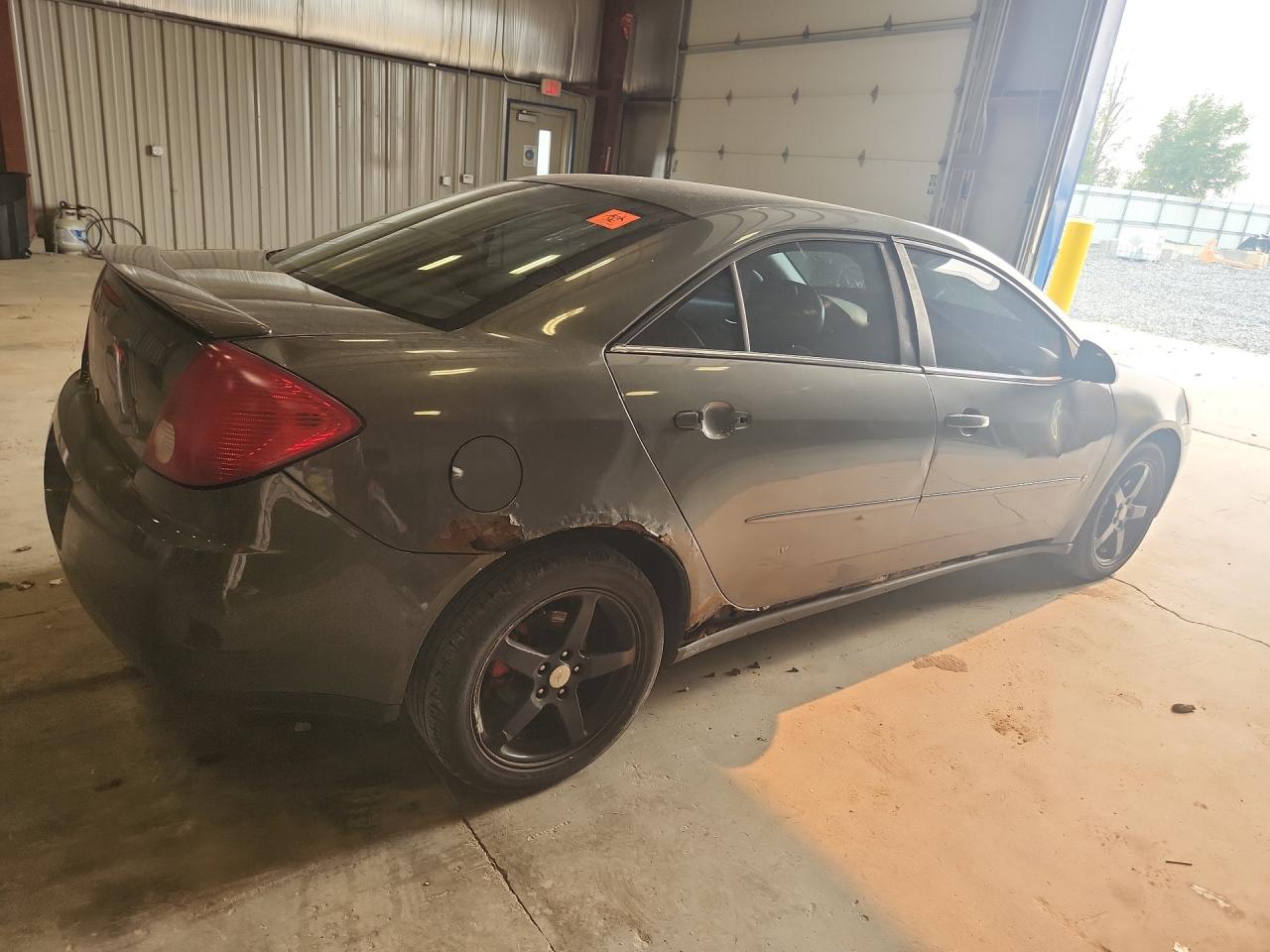 2007 Pontiac G6 Base Charcoal vin: 1G2ZG58N174179821 Damage: Right Qtr Panel, Rust, > 12 Inches