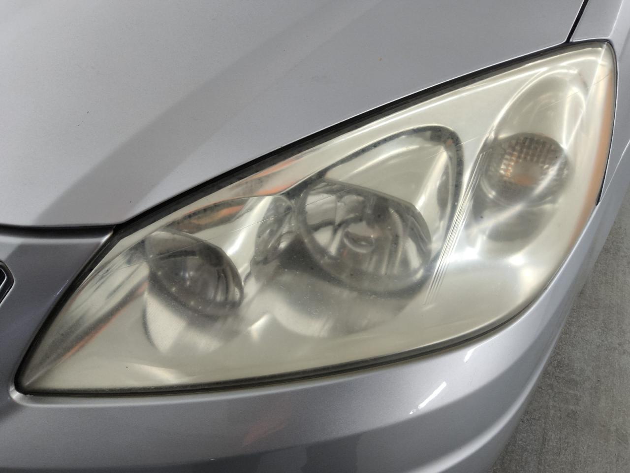 2009 Pontiac G6 Gray vin: 1G2ZJ57B494240963 Damage: Left Head Lamp, Faded, Repair Required