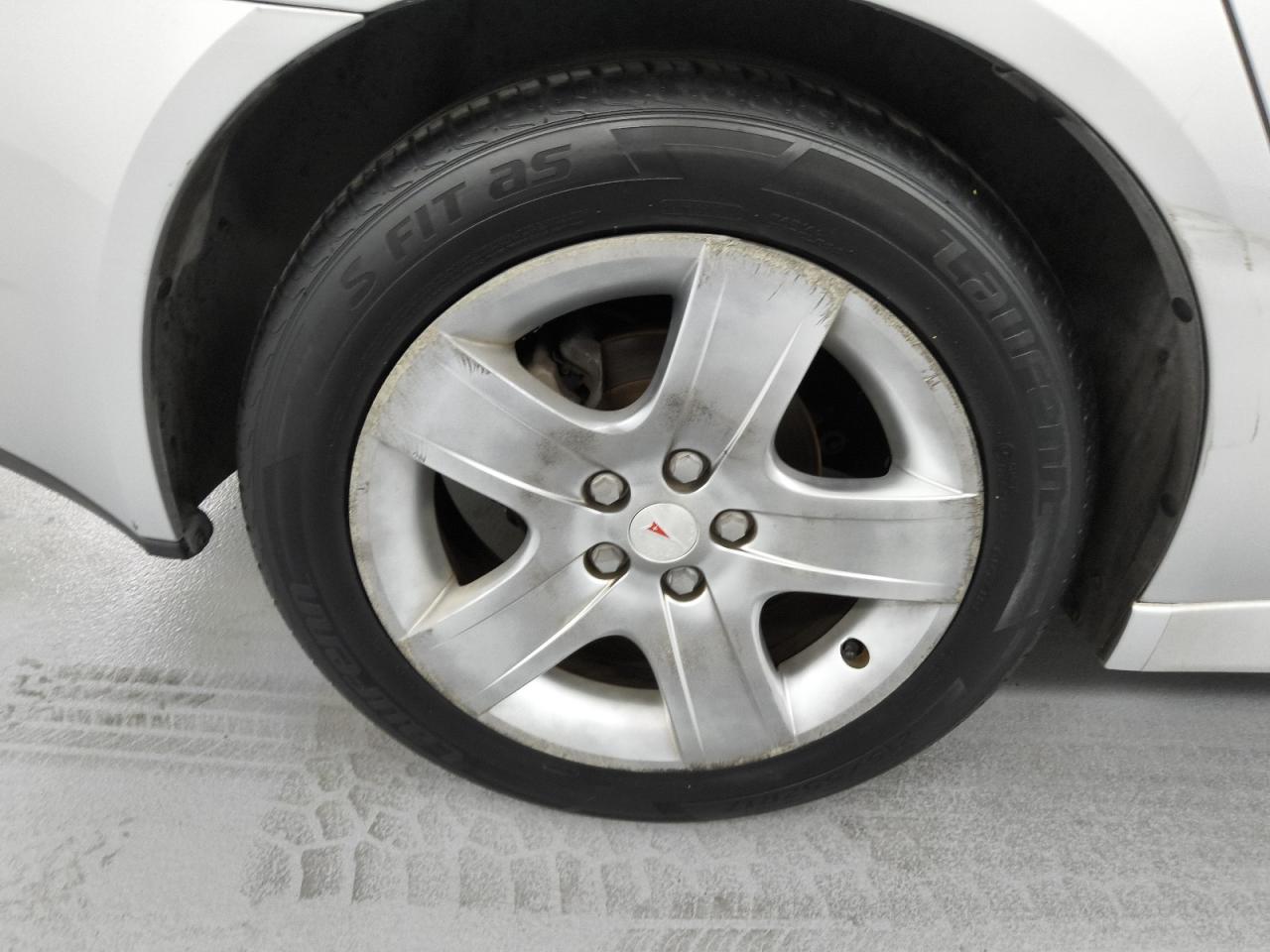 2009 Pontiac G6 Gray vin: 1G2ZJ57B494240963 Damage: Right Rear Wheel, Curb Rash, > 12 Inches
