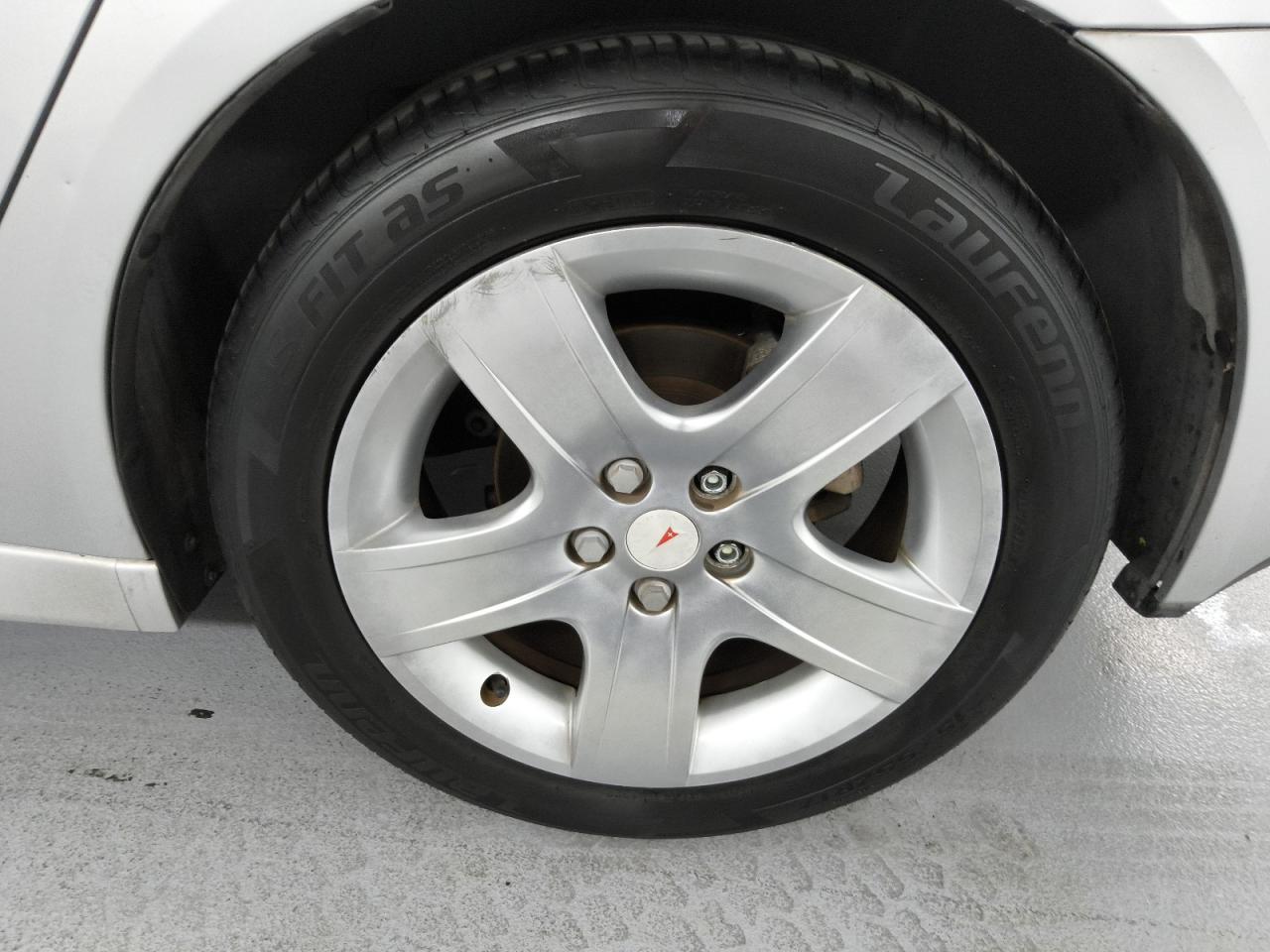 2009 Pontiac G6 Gray vin: 1G2ZJ57B494240963 Damage: Left Rear Wheel, Curb Rash, > 12 Inches