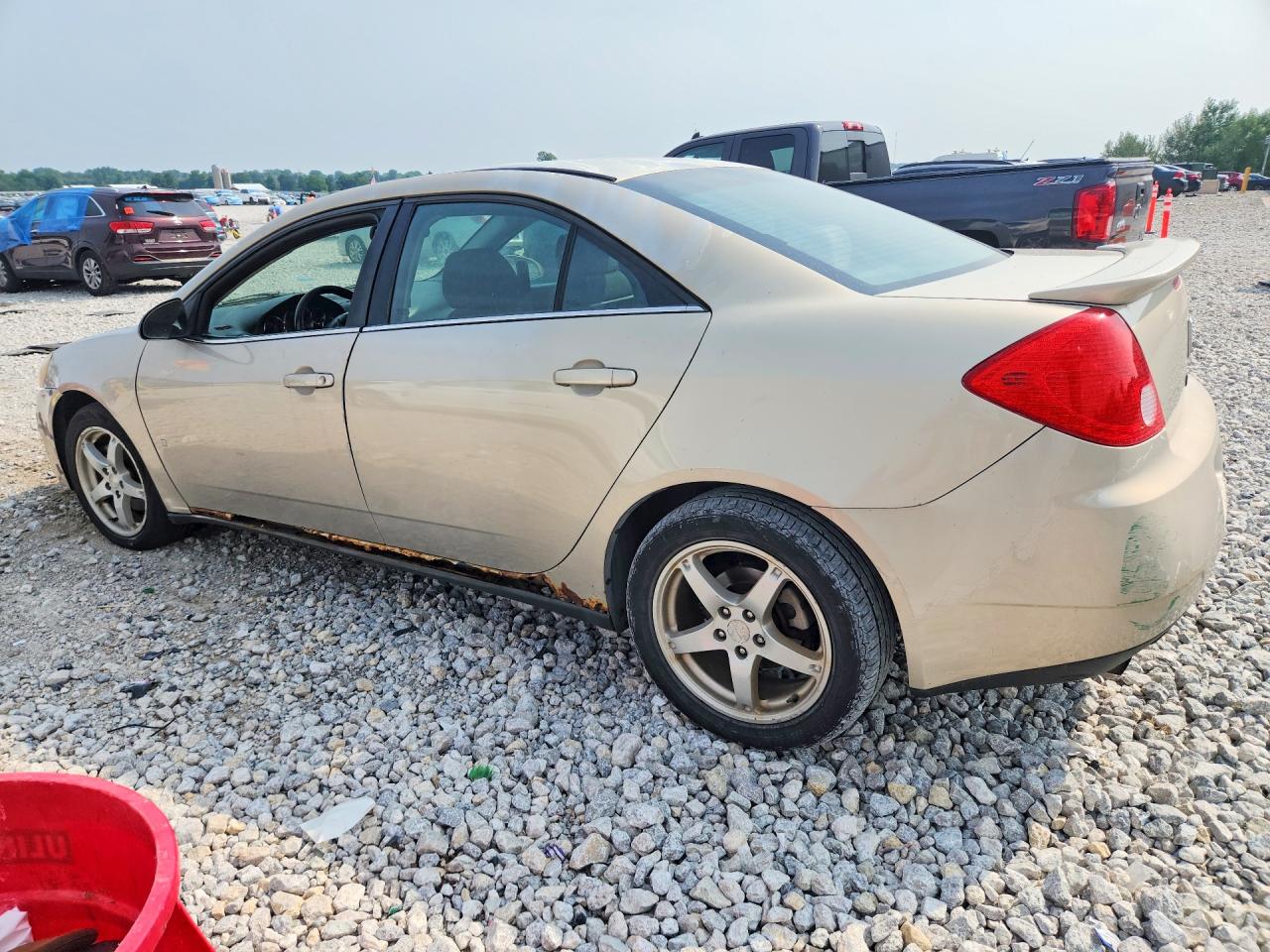 2009 Pontiac G6 Beige vin: 1G2ZJ57K394259679