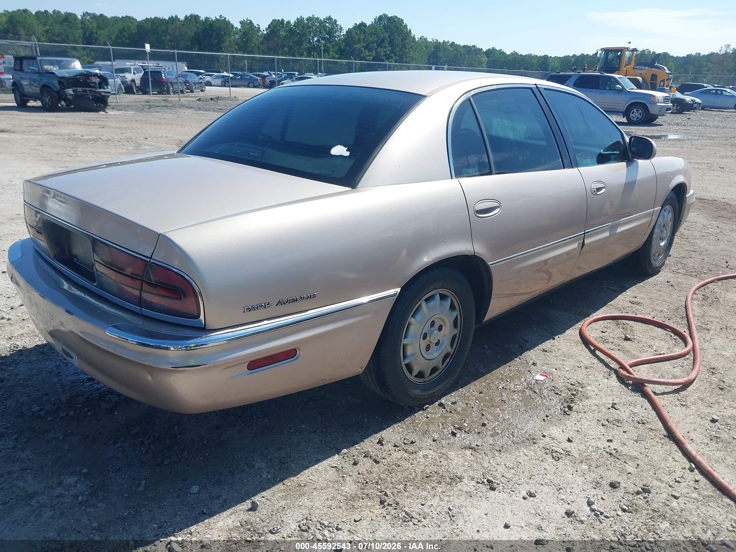 1999 Buick Park Avenue   Champagne vin: 1G4CW52K0X4635418