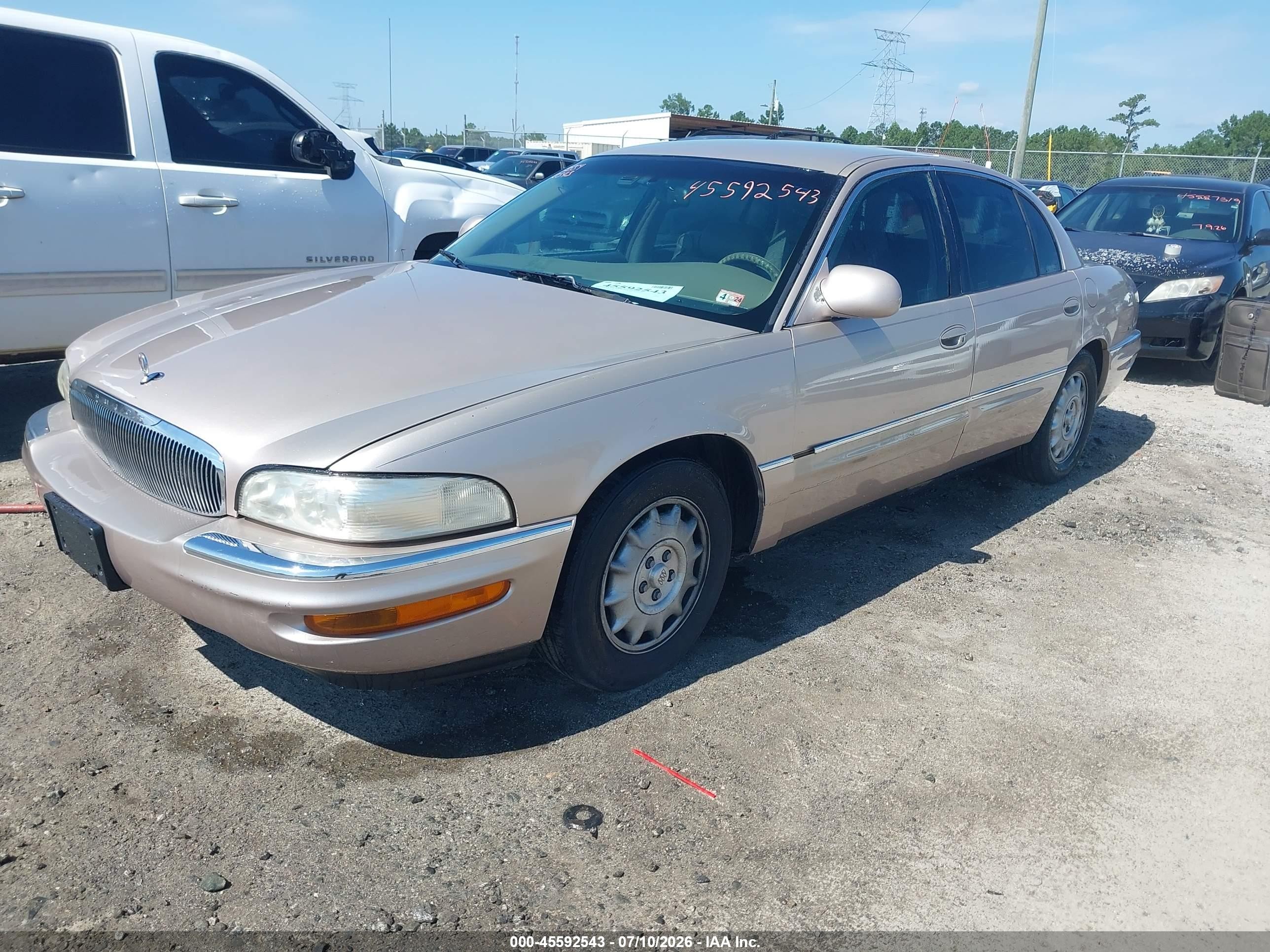 1999 Buick Park Avenue   Champagne vin: 1G4CW52K0X4635418