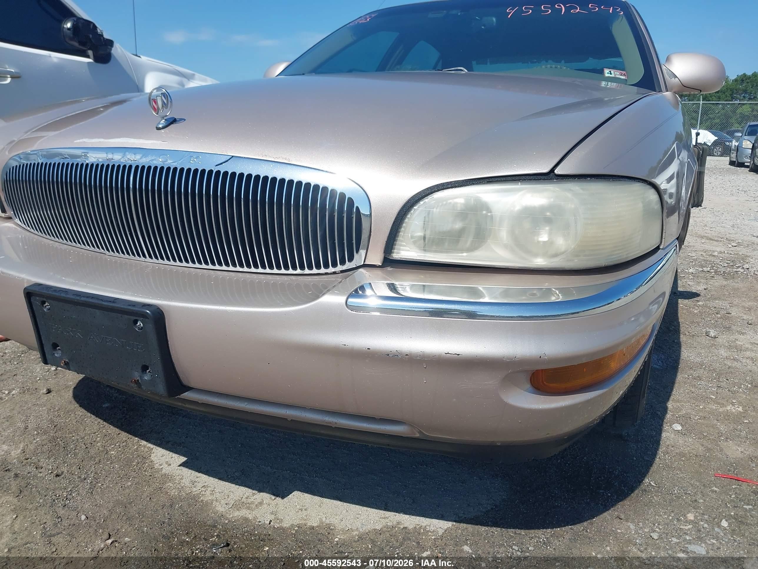 1999 Buick Park Avenue   Champagne vin: 1G4CW52K0X4635418