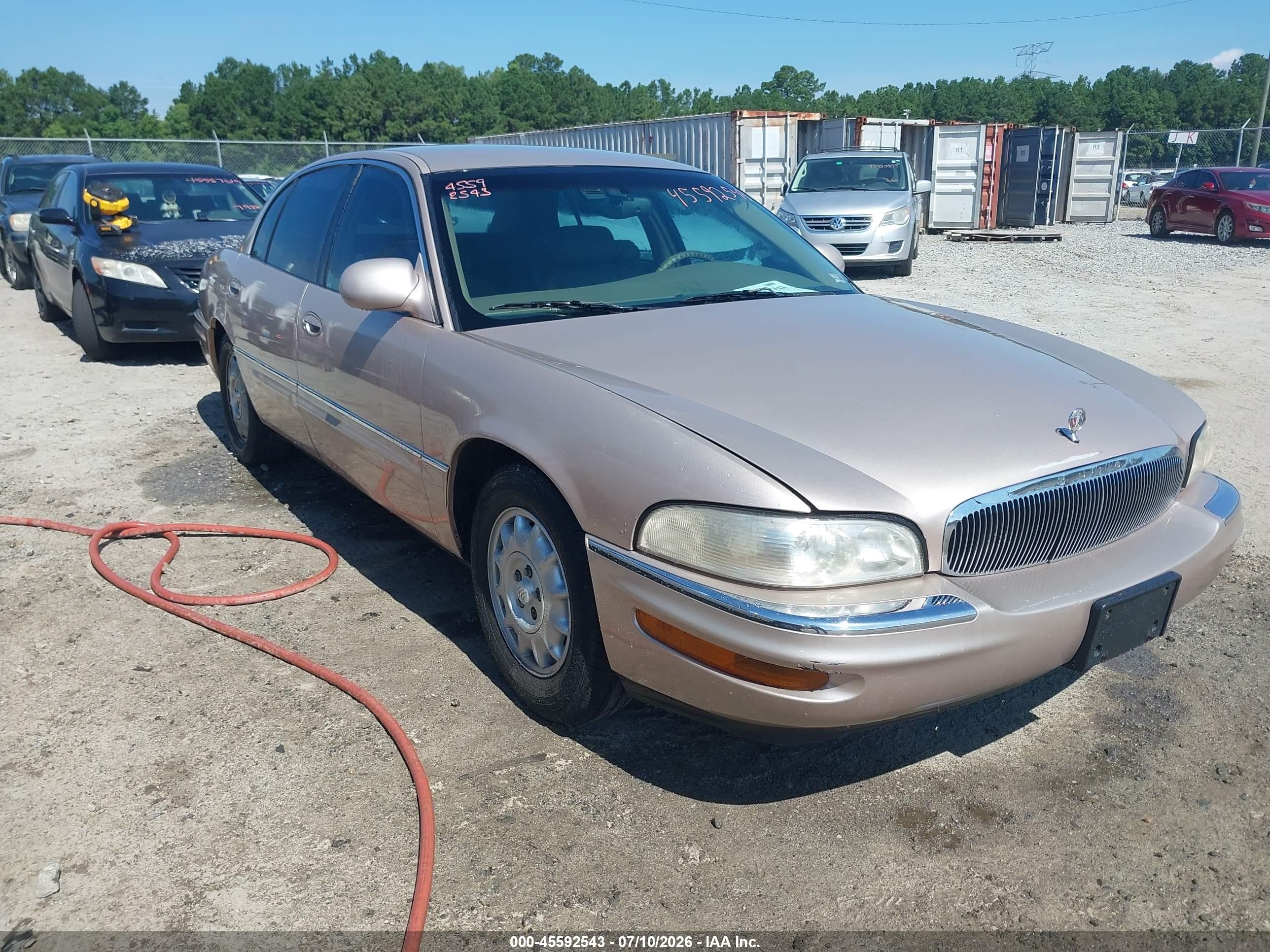 1999 Buick Park Avenue   Champagne vin: 1G4CW52K0X4635418