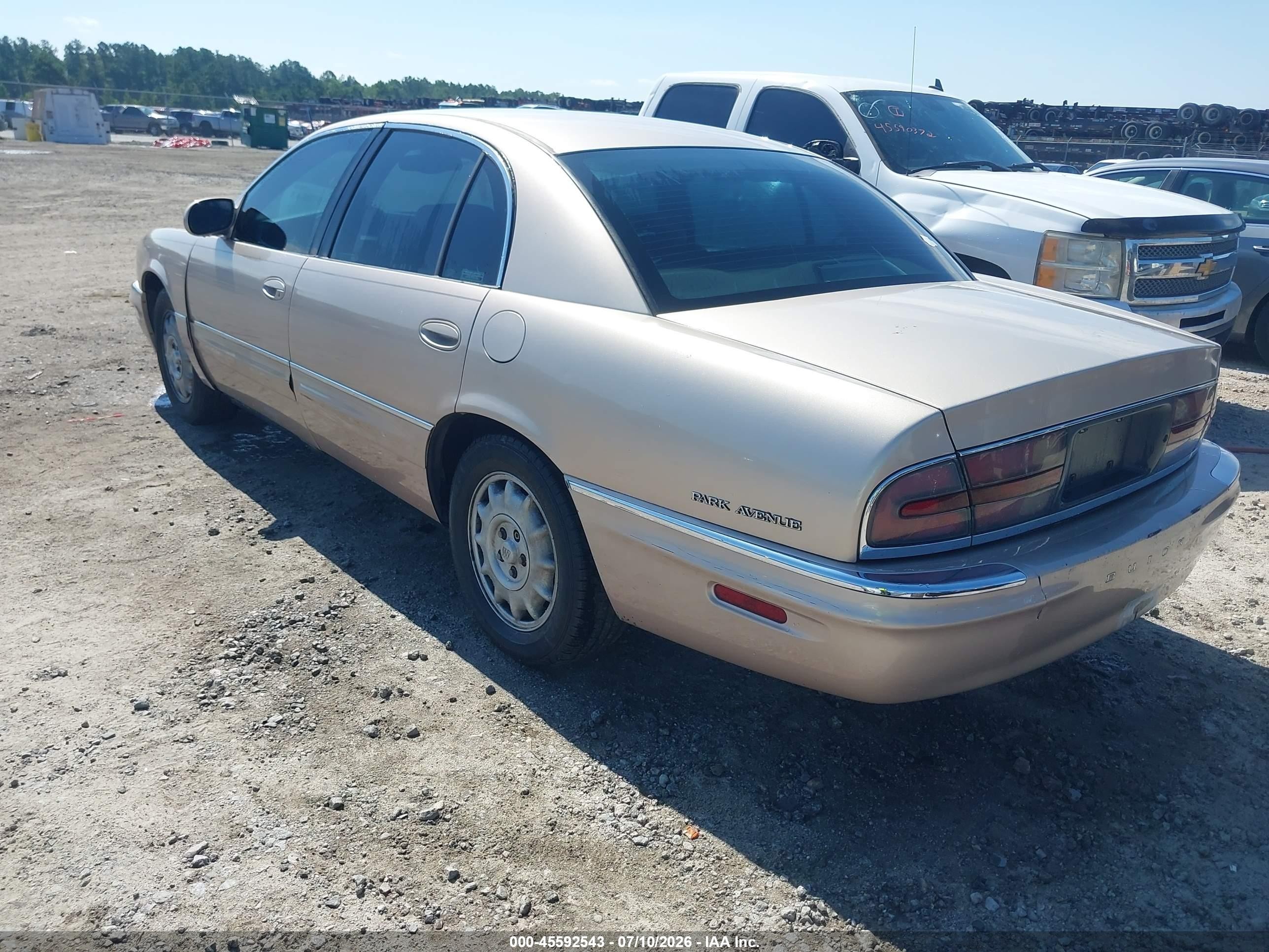 1999 Buick Park Avenue   Champagne vin: 1G4CW52K0X4635418