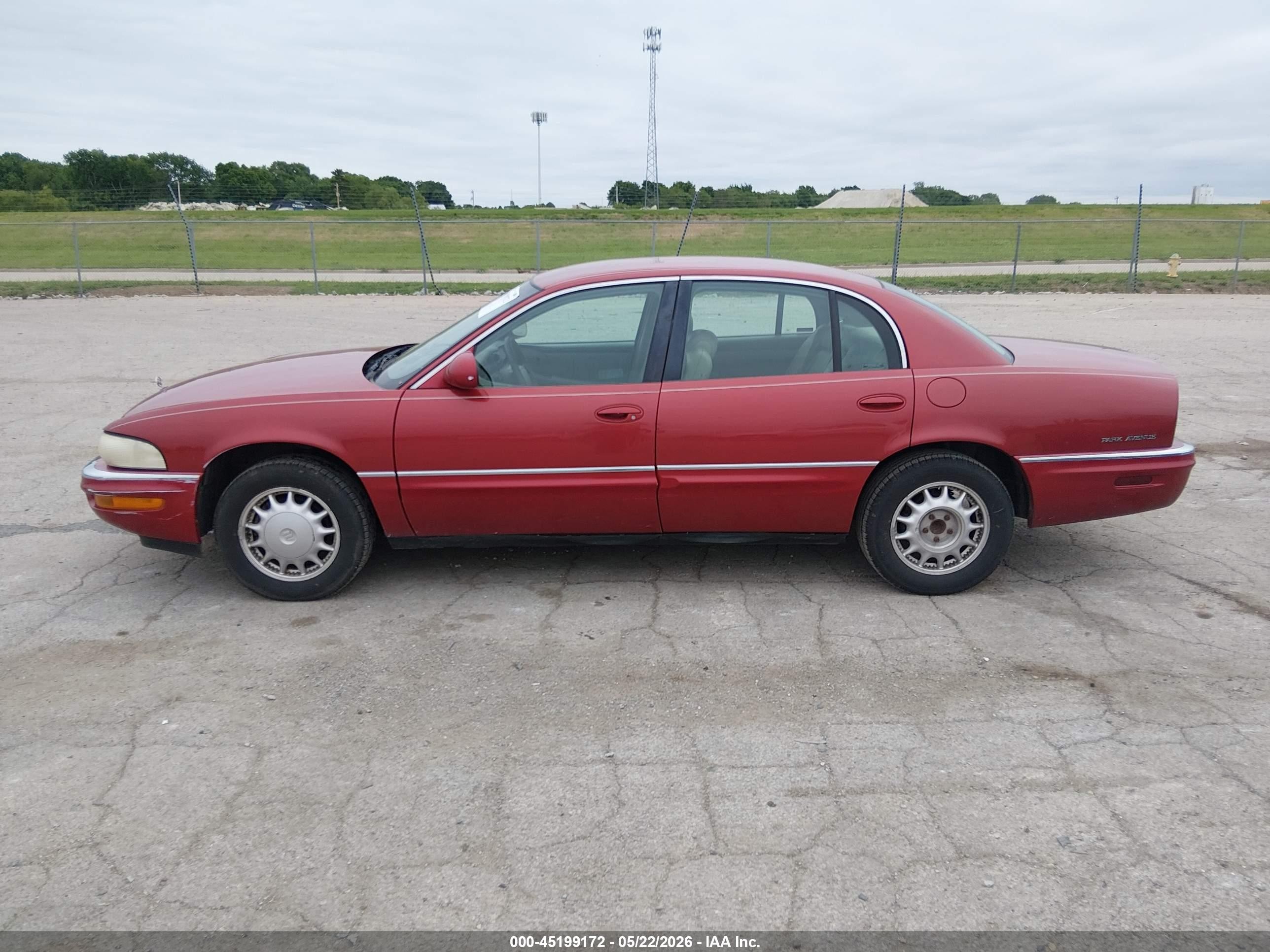 1999 Buick Park Avenue   Red vin: 1G4CW52K0X4645172