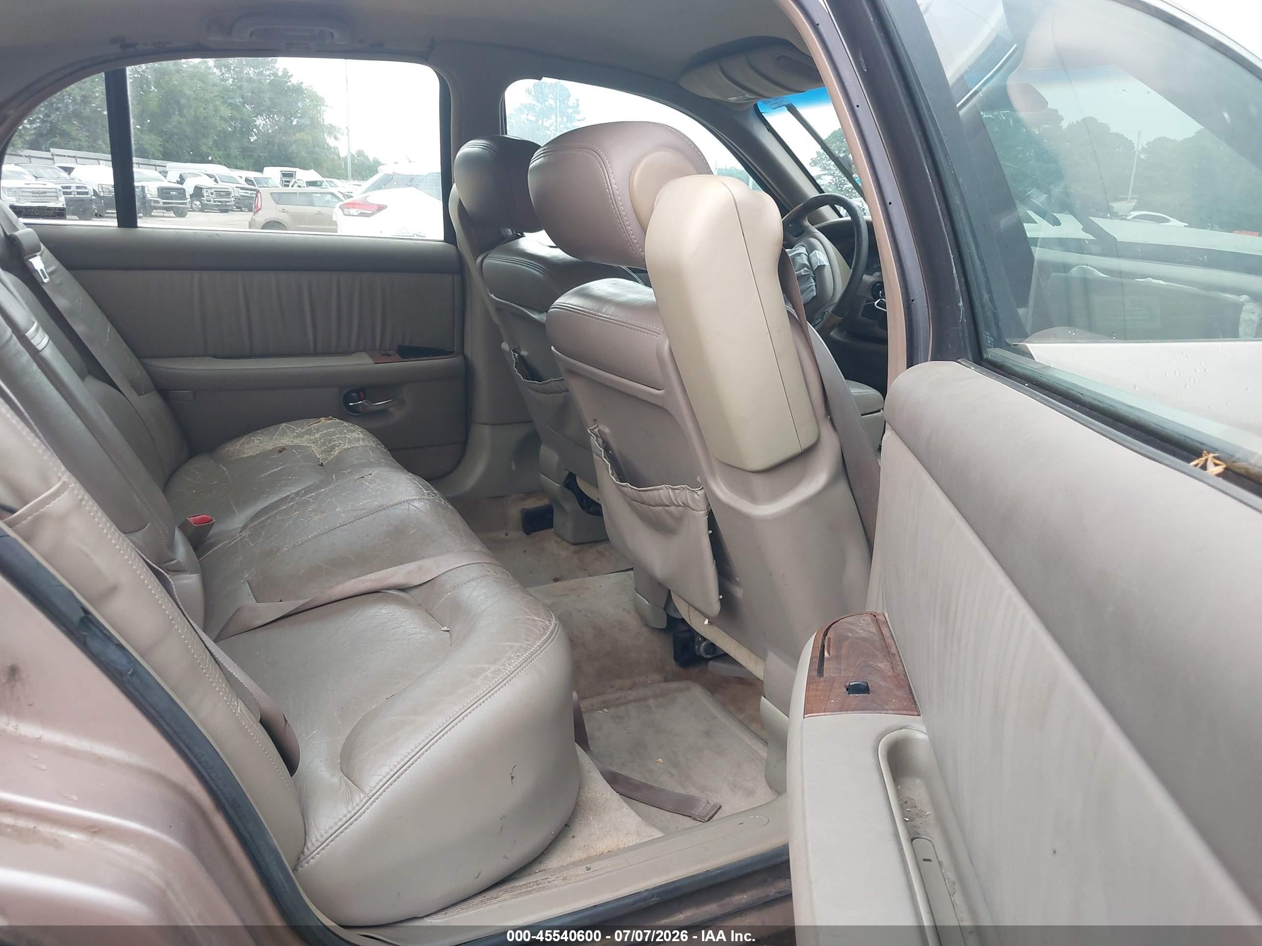 1999 Buick Park Avenue   Tan vin: 1G4CW52K2X4639549