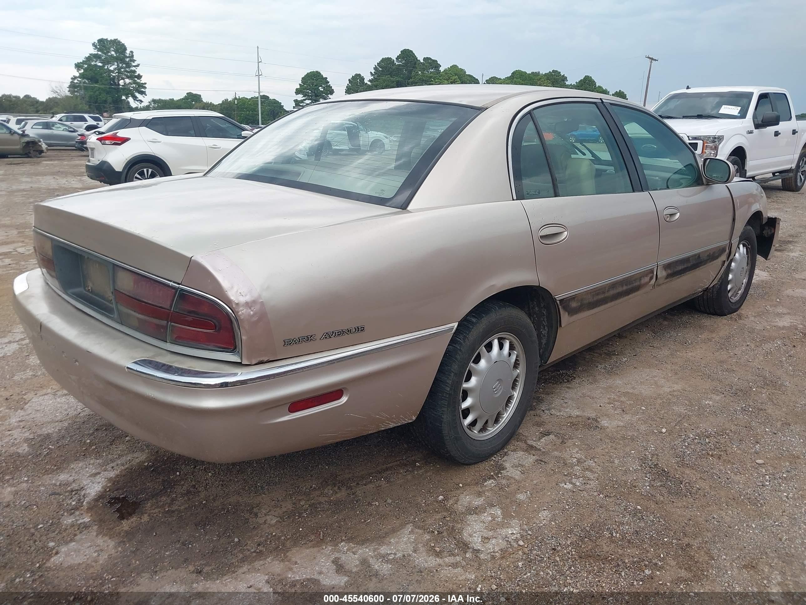 1999 Buick Park Avenue   Tan vin: 1G4CW52K2X4639549