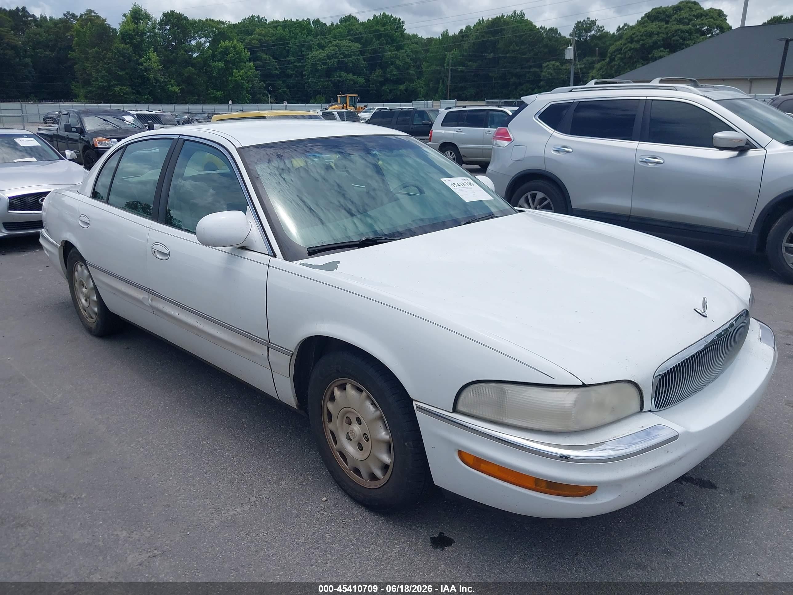 1999 Buick Park Avenue   White vin: 1G4CW52K4X4657311