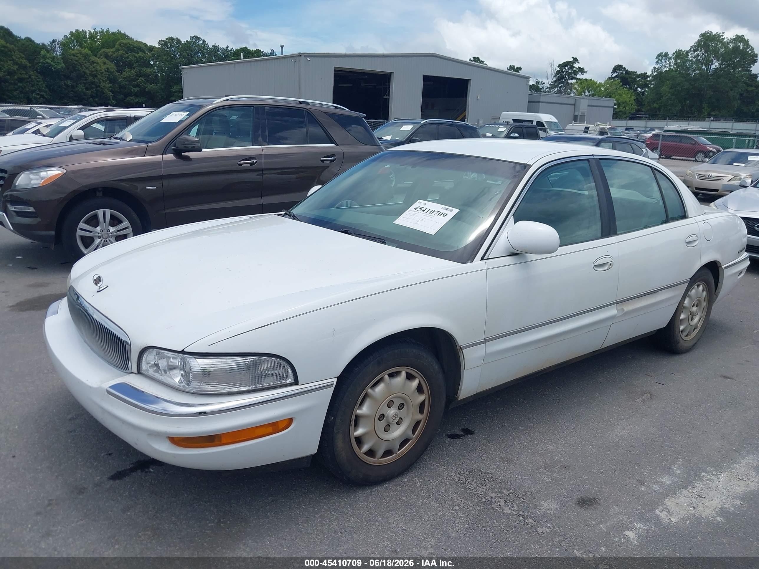 1999 Buick Park Avenue   White vin: 1G4CW52K4X4657311