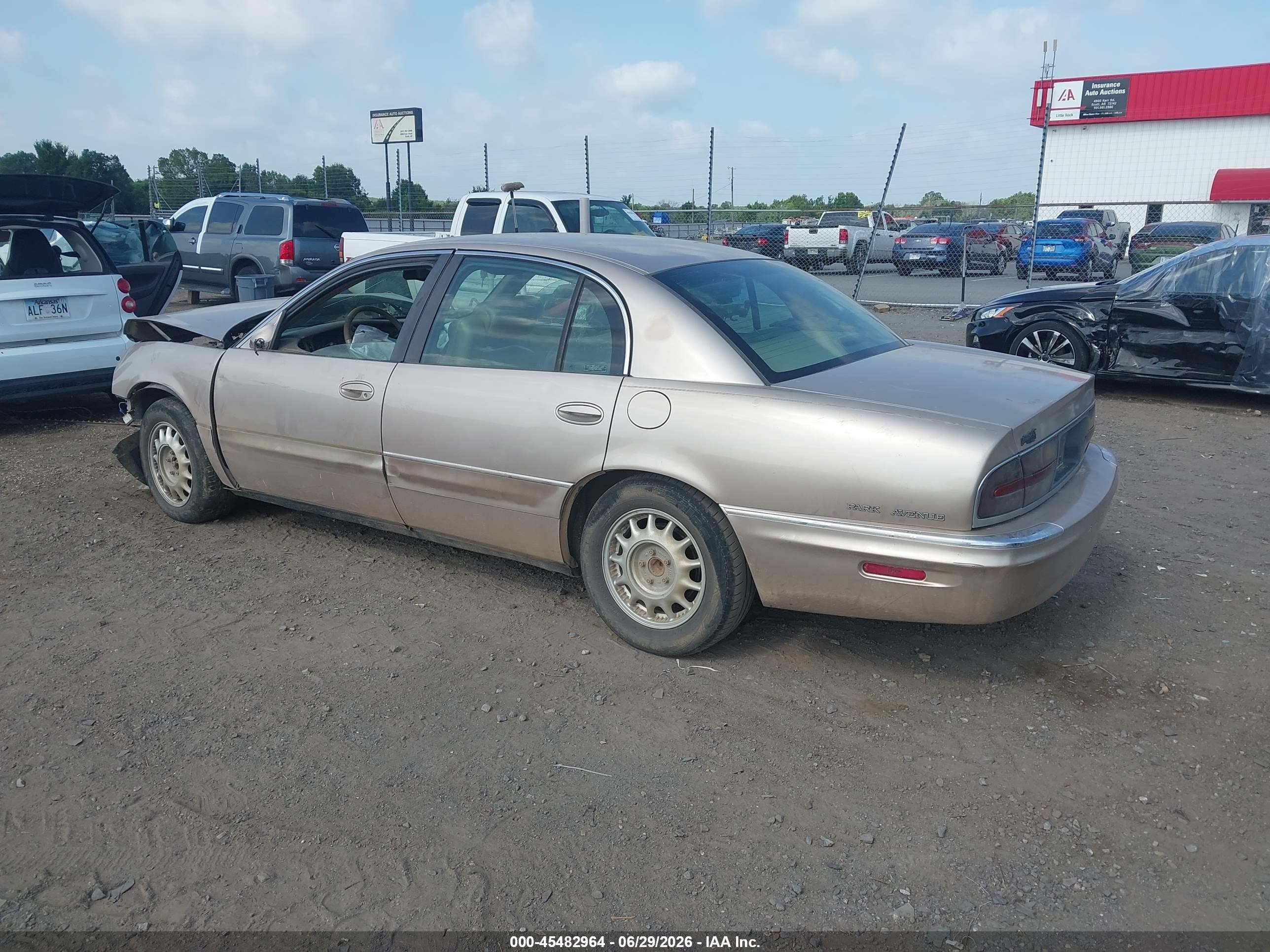 1999 Buick Park Avenue   Champagne vin: 1G4CW52K4X4658166
