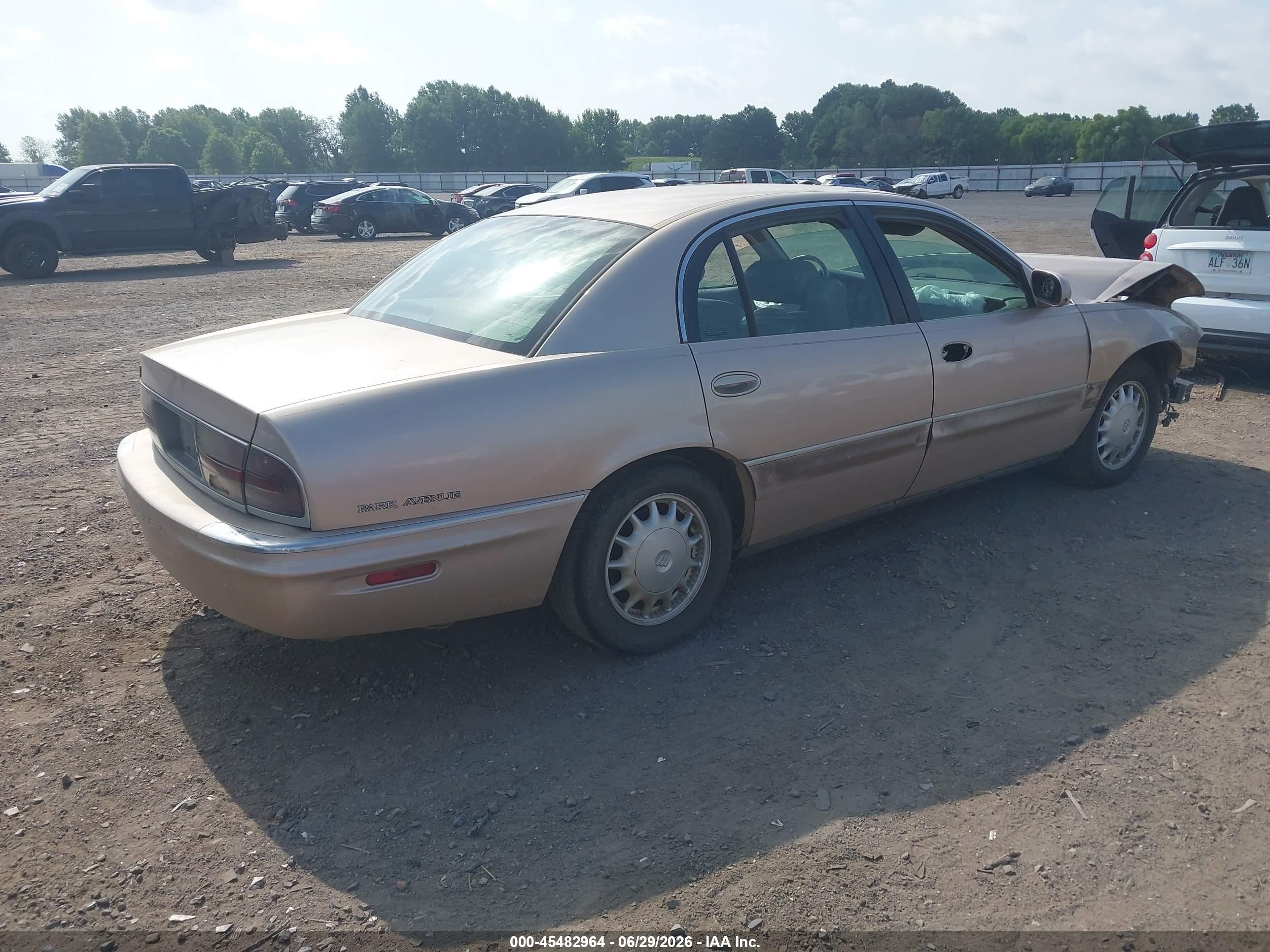 1999 Buick Park Avenue   Champagne vin: 1G4CW52K4X4658166
