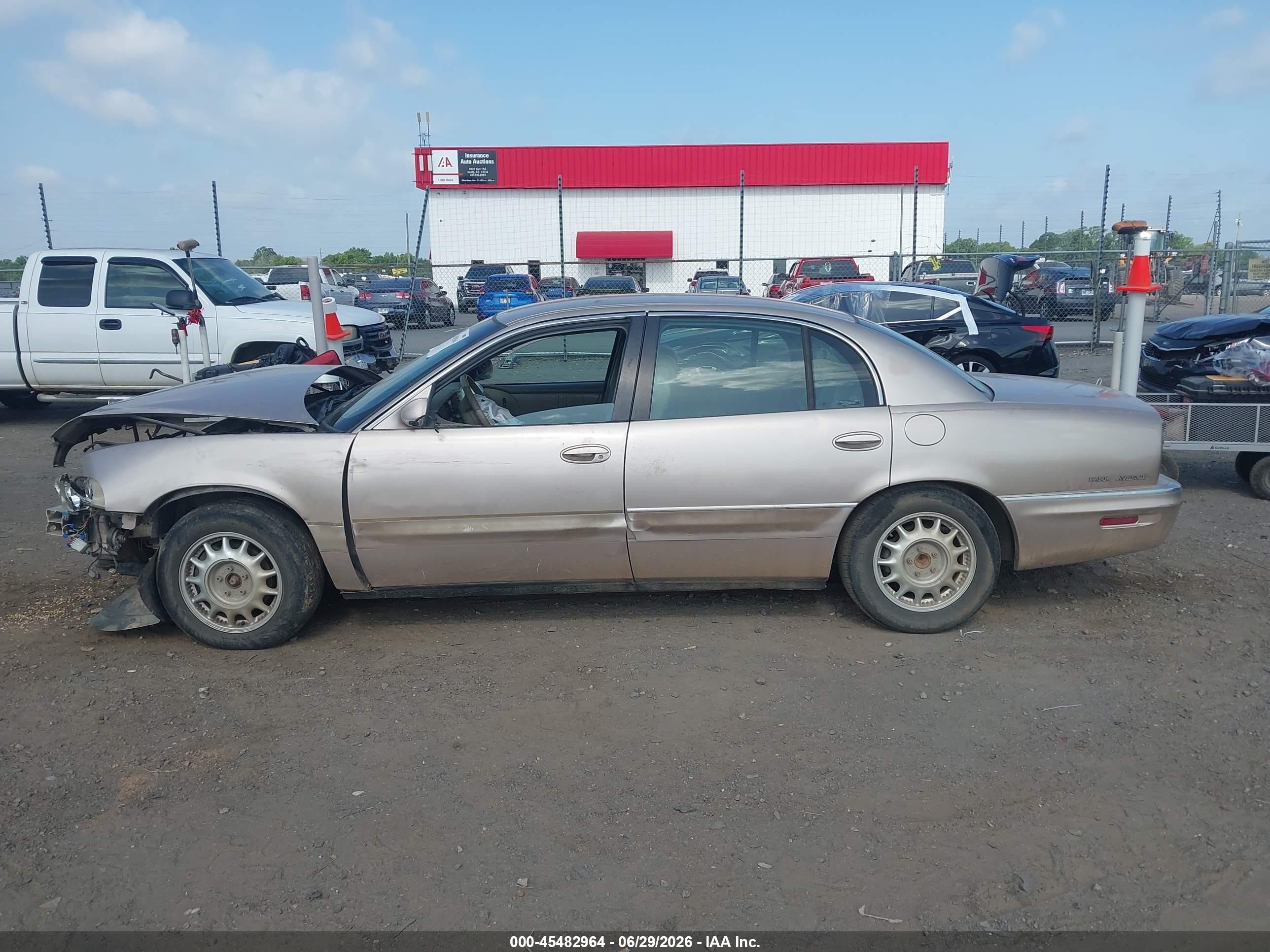 1999 Buick Park Avenue   Champagne vin: 1G4CW52K4X4658166