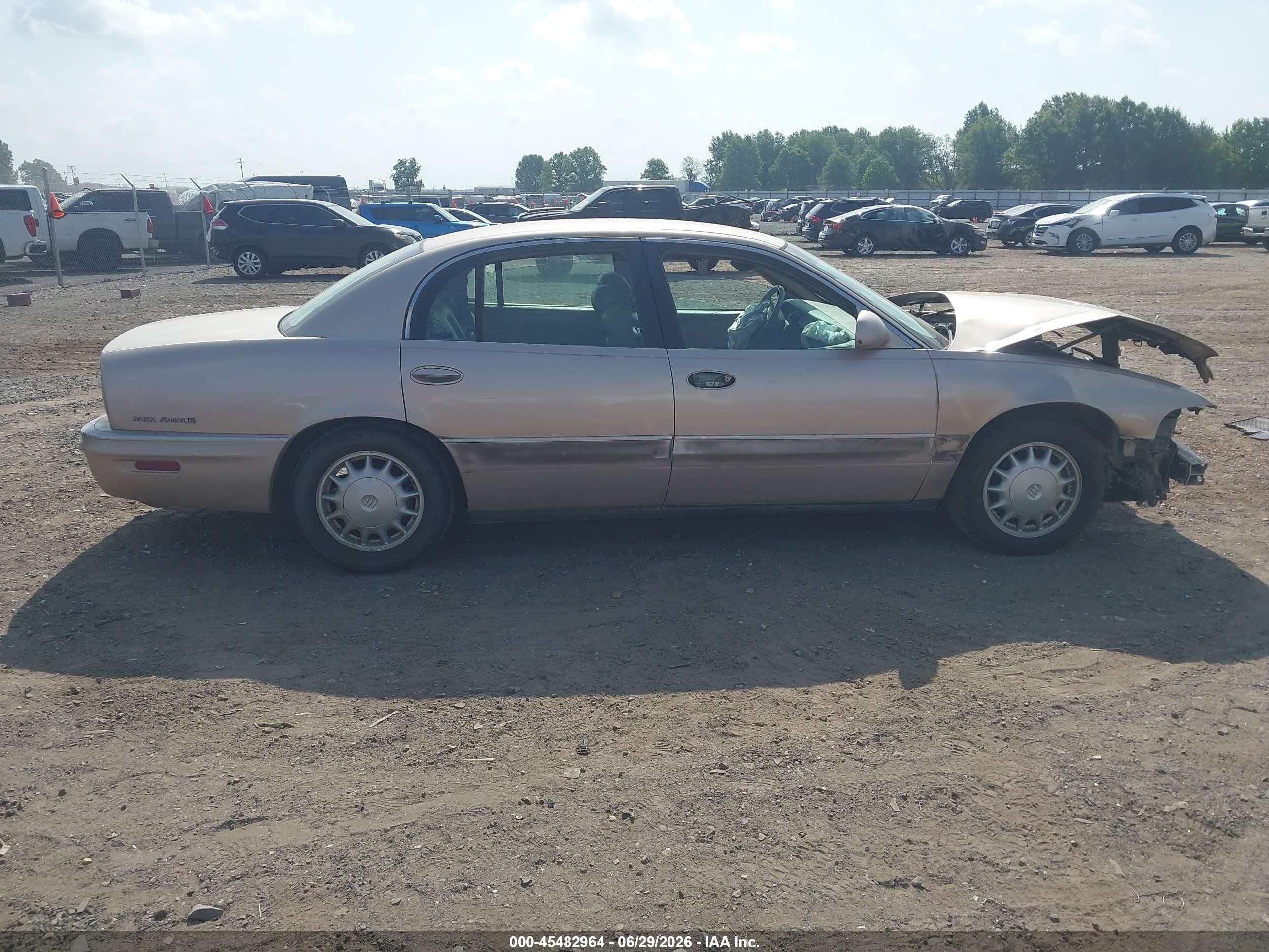 1999 Buick Park Avenue   Champagne vin: 1G4CW52K4X4658166