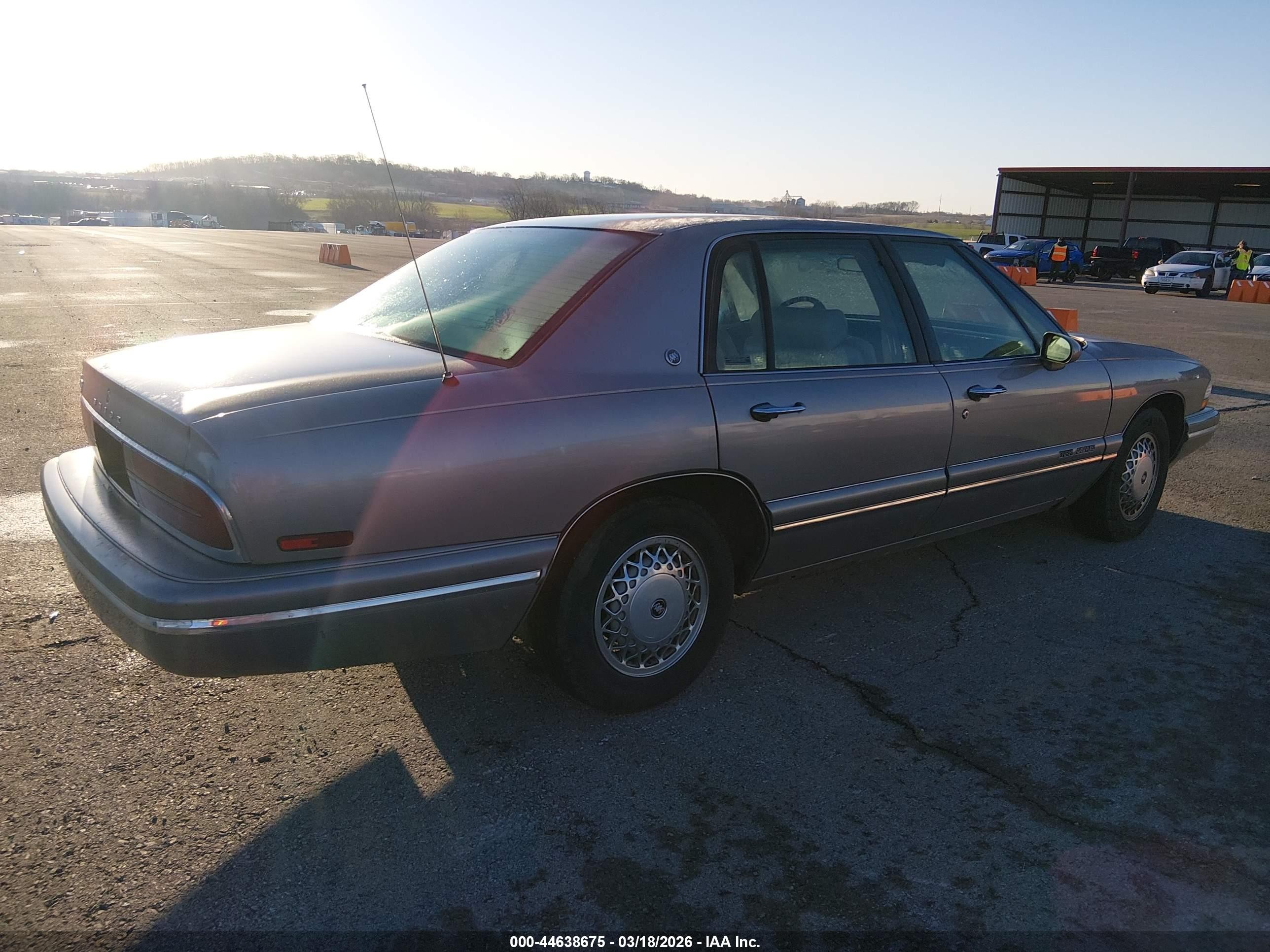 1995 Buick Park Avenue   Tan vin: 1G4CW52K9SH614410