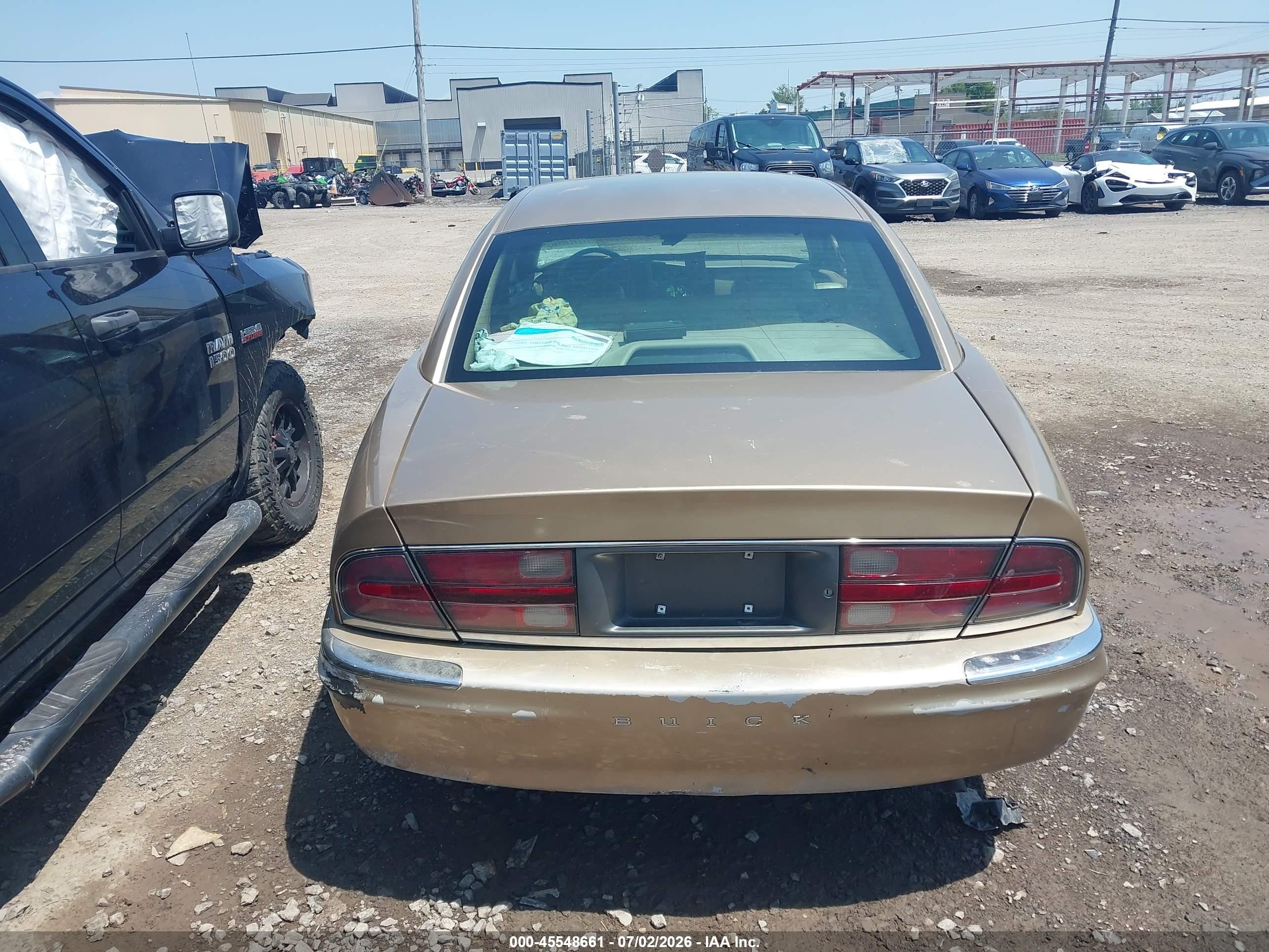 1999 Buick Park Avenue Gold vin: 1G4CW52K9X4639337