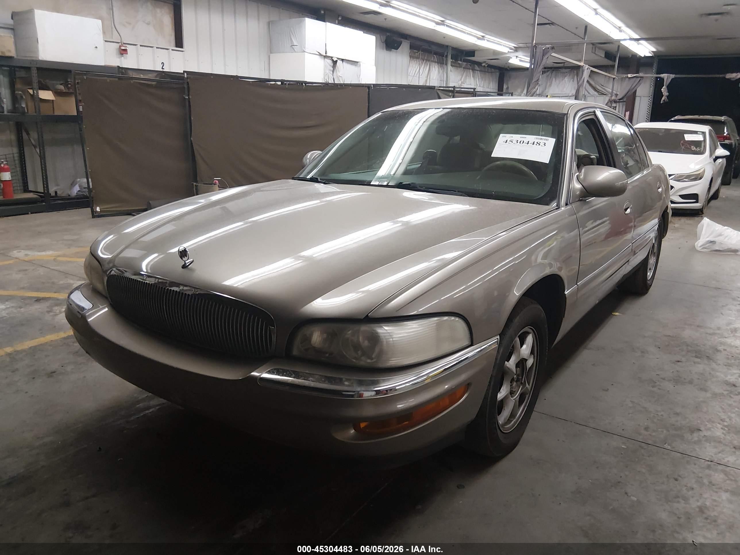 2000 Buick Park Avenue   Tan vin: 1G4CW52K9Y4217344