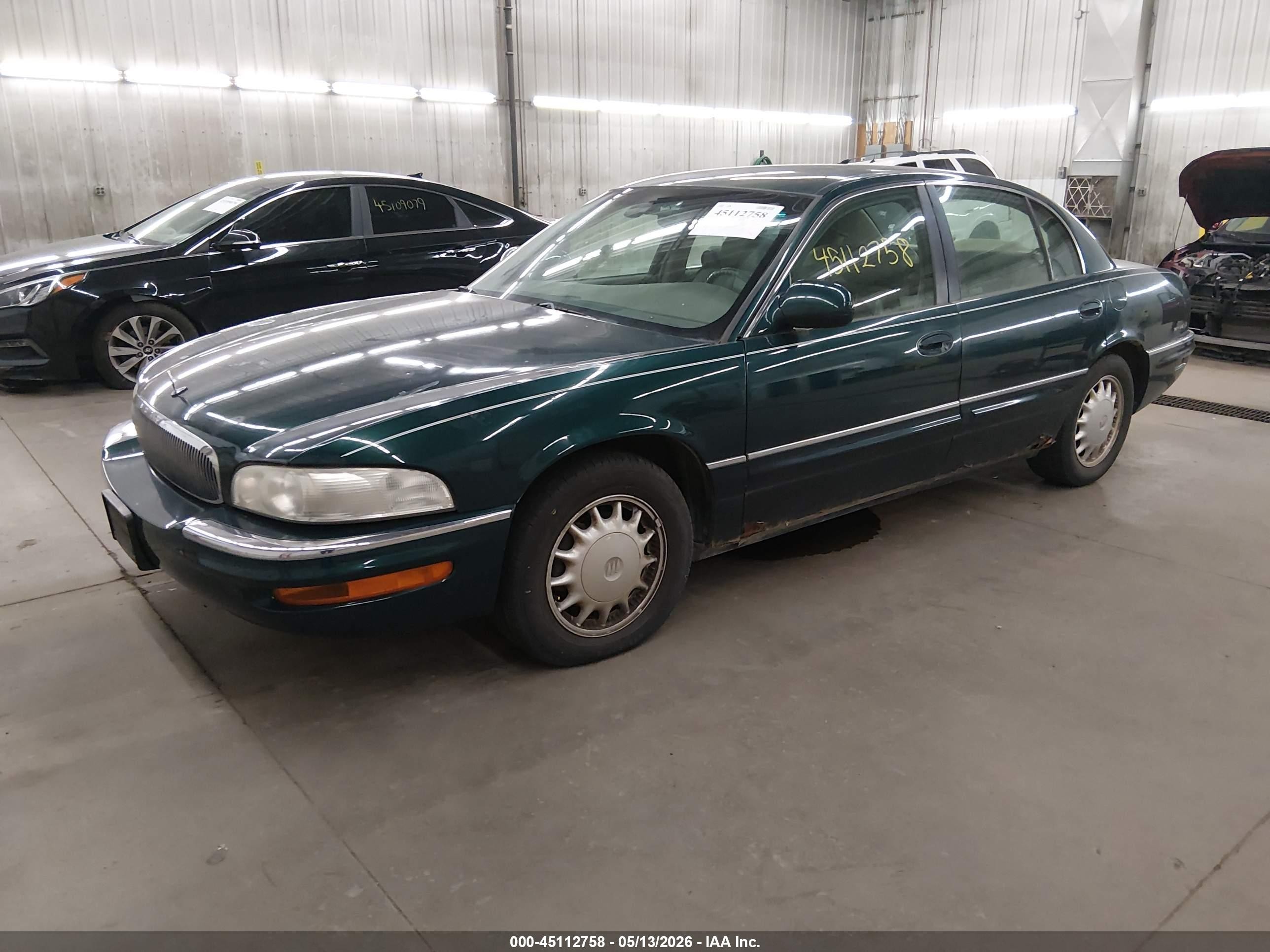 1999 Buick Park Avenue   Green vin: 1G4CW52KXX4608968