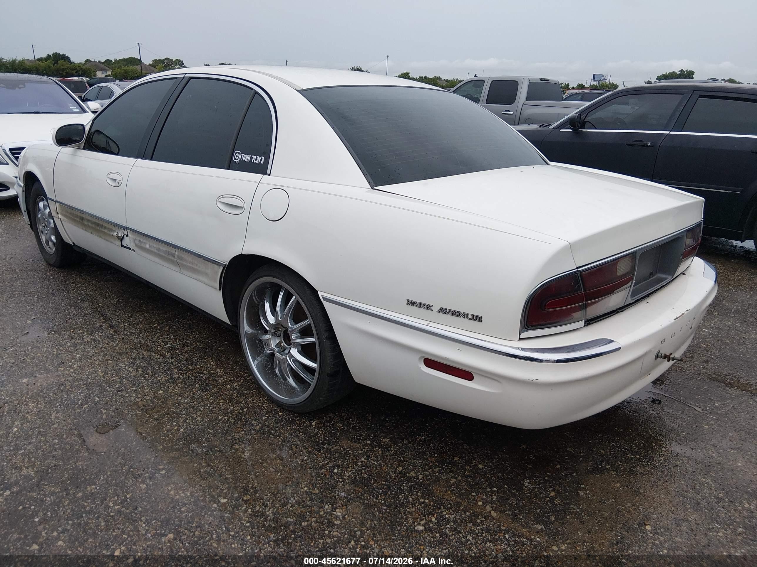 2001 Buick Park Avenue   White vin: 1G4CW54K614276788