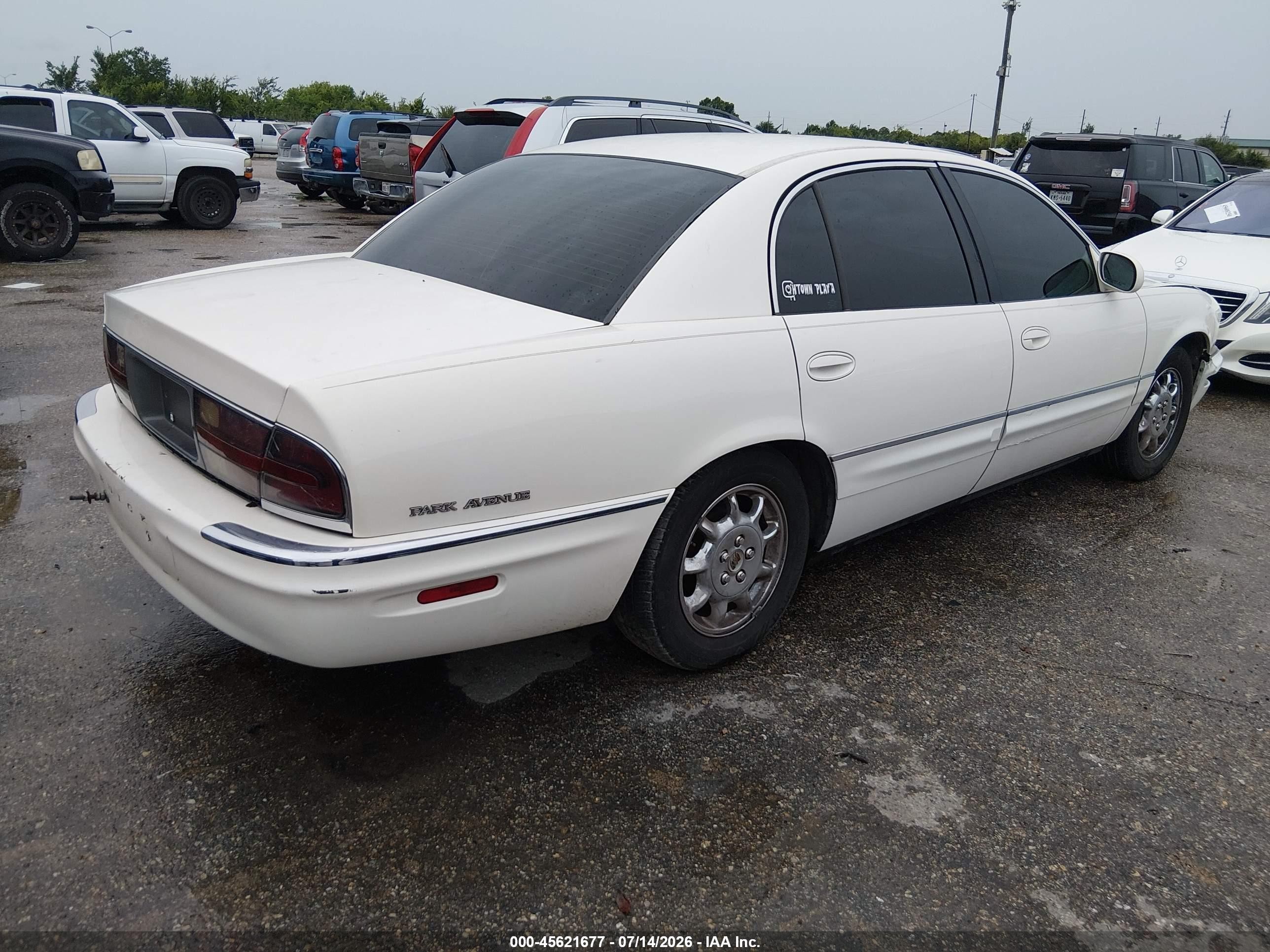 2001 Buick Park Avenue   White vin: 1G4CW54K614276788