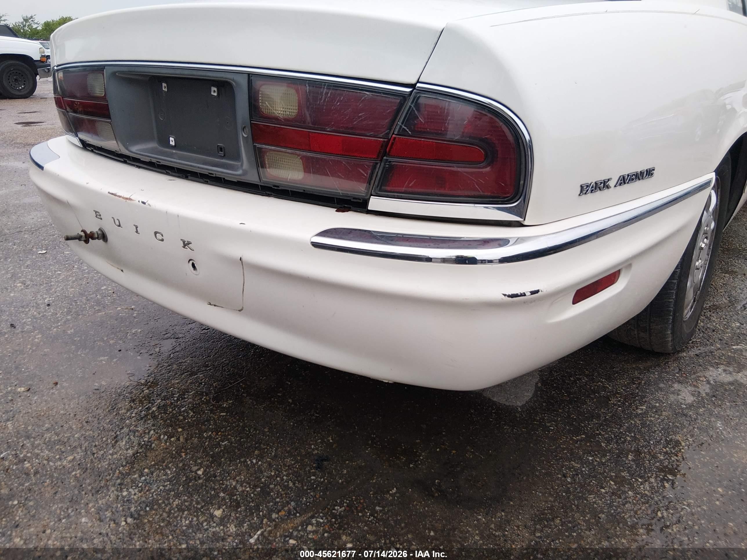 2001 Buick Park Avenue   White vin: 1G4CW54K614276788