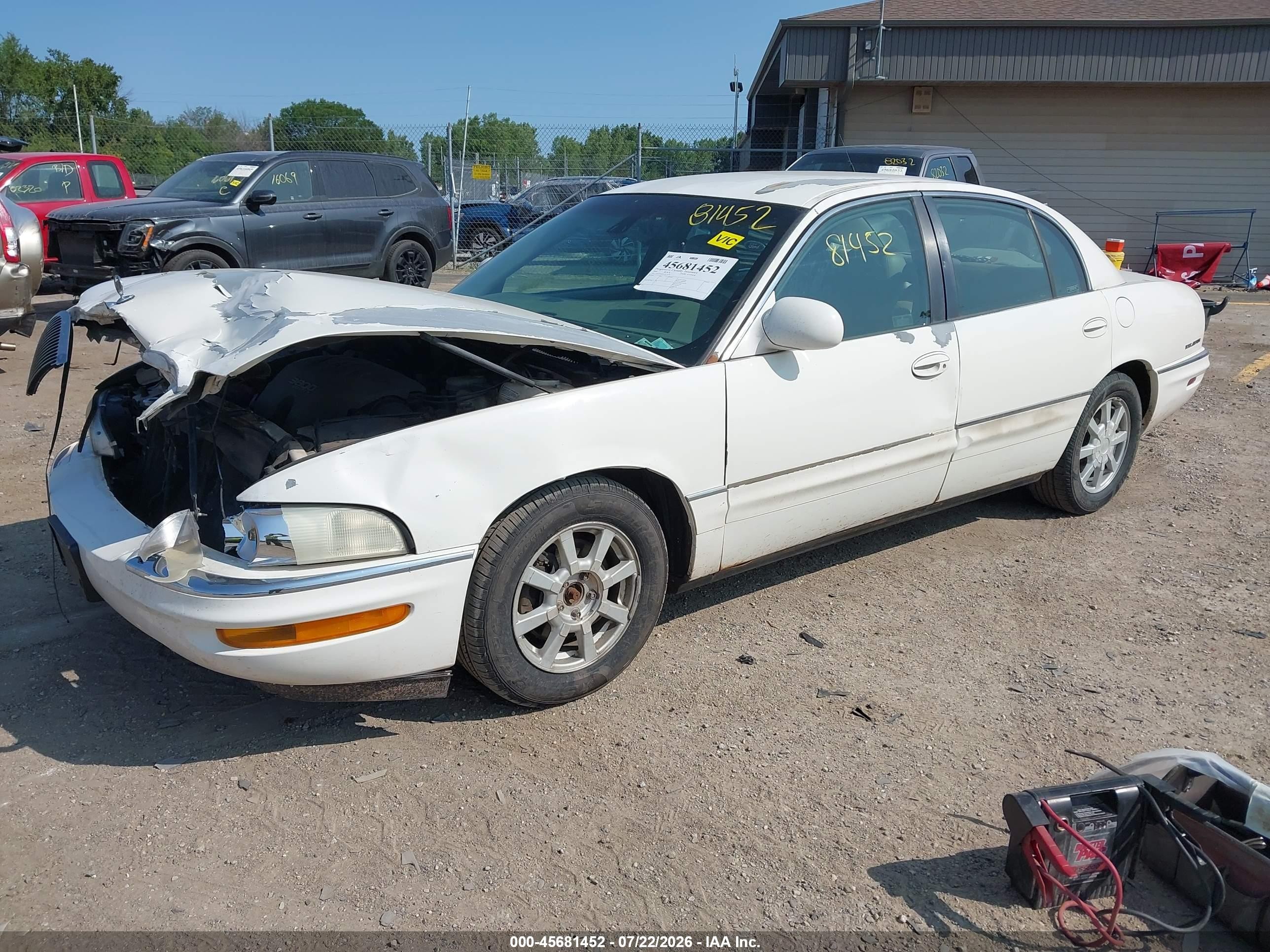 2001 Buick Park Avenue   White vin: 1G4CW54KX14173776