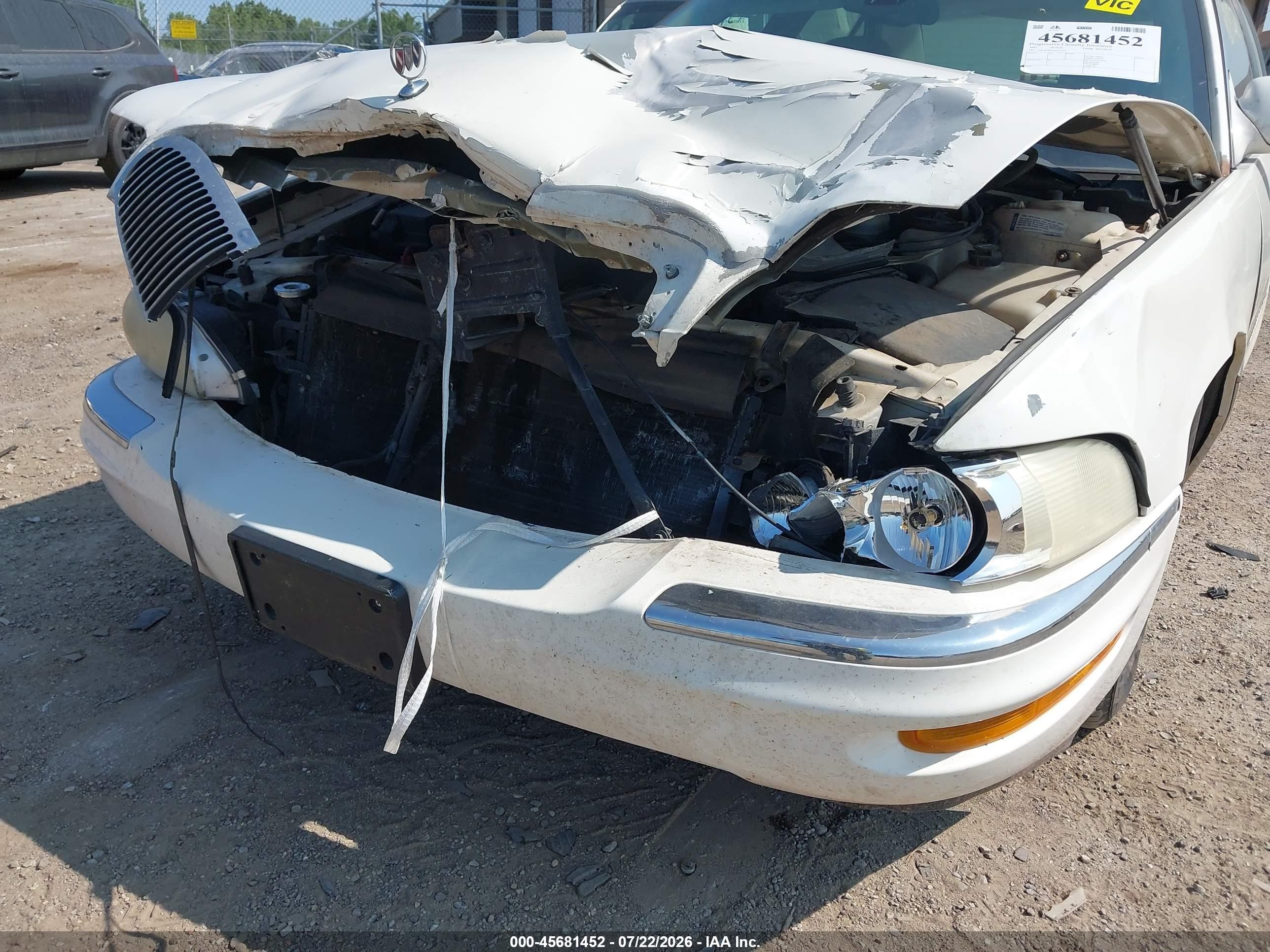 2001 Buick Park Avenue   White vin: 1G4CW54KX14173776