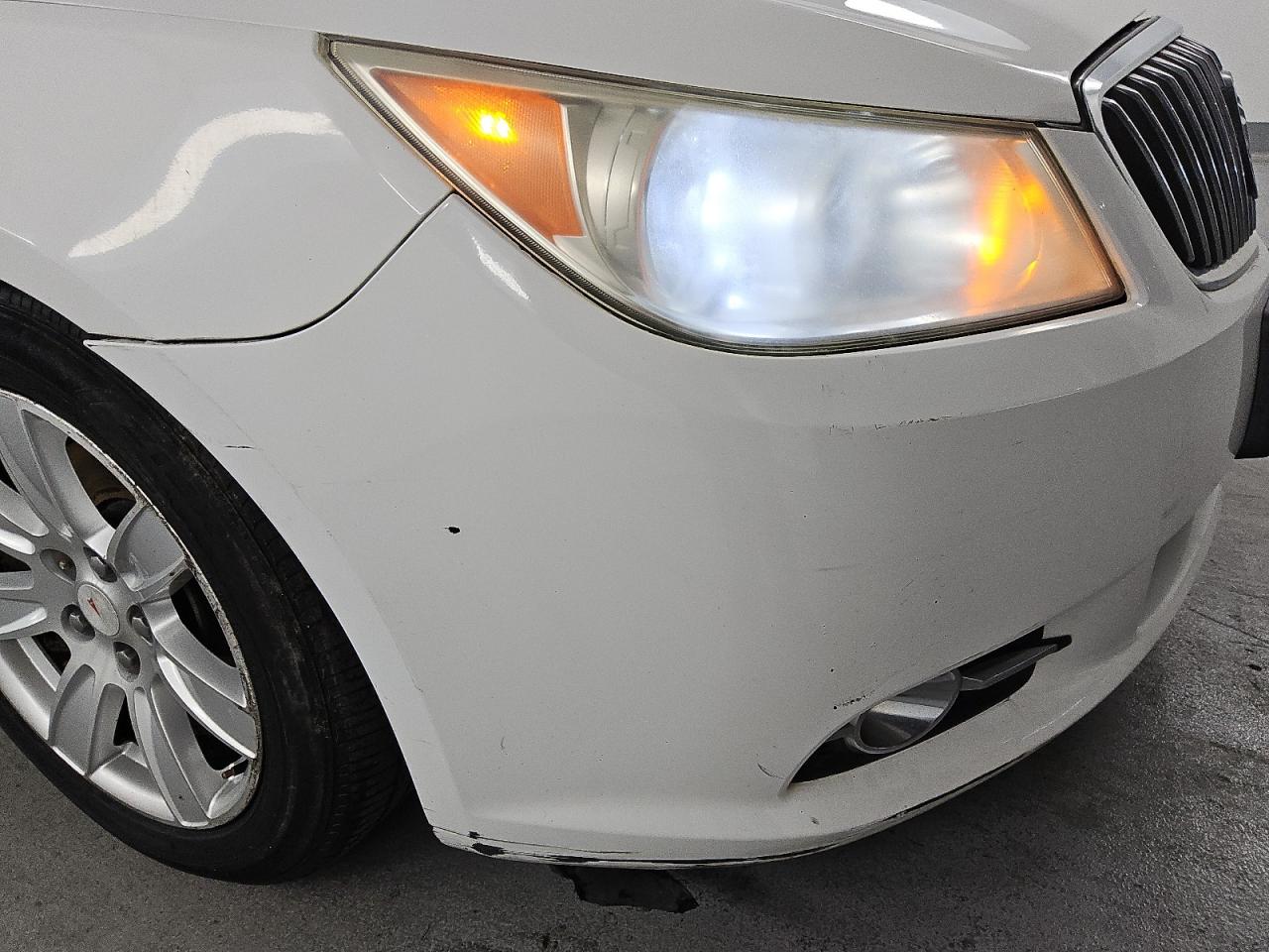 2013 Buick Lacrosse White vin: 1G4GC5E36DF162428 Damage: Front Bumper, Multiple Scratches Heavy, 4