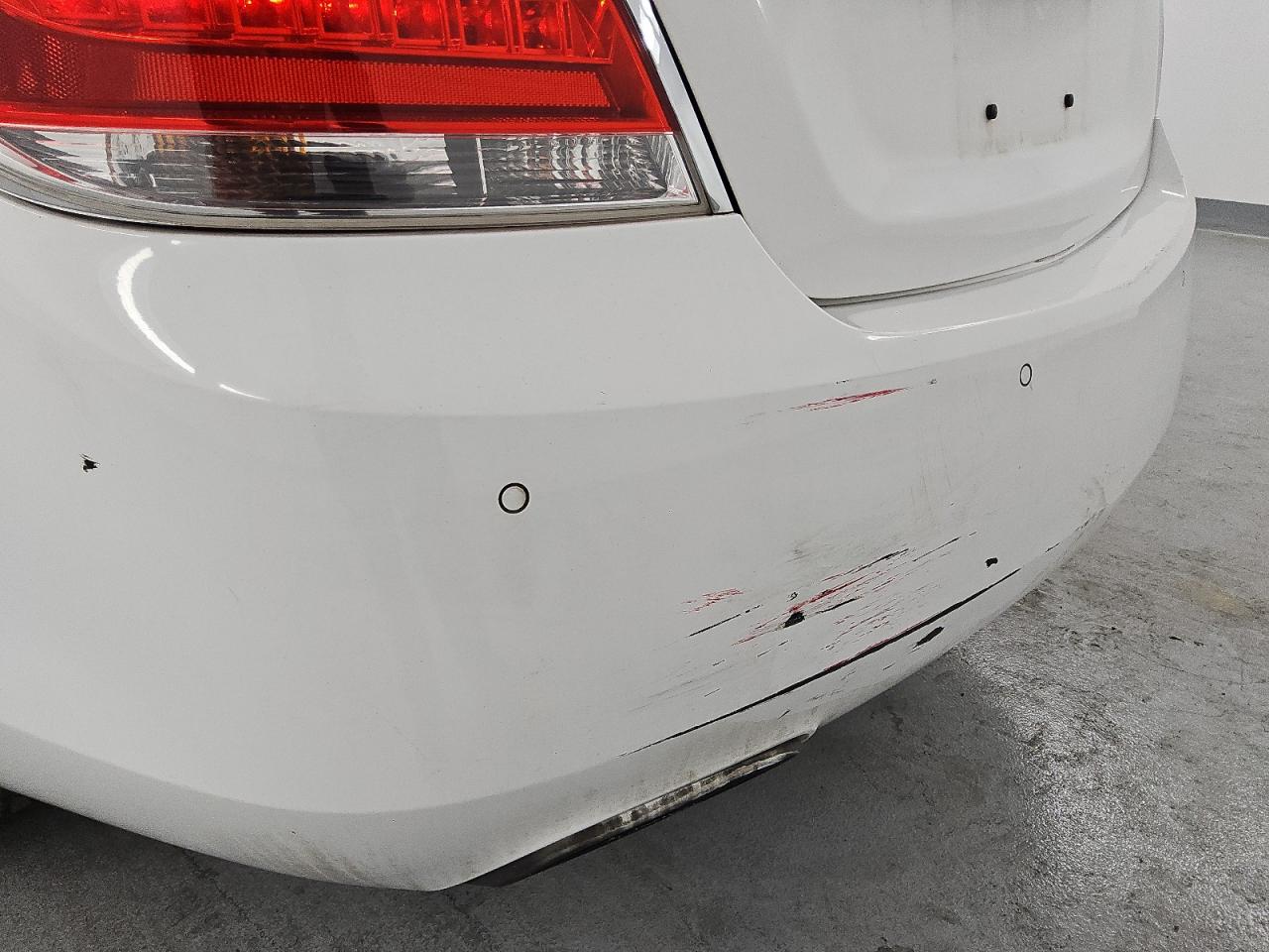 2013 Buick Lacrosse White vin: 1G4GC5E36DF162428 Damage: Rear Bumper, Multiple Scratches Heavy, 4