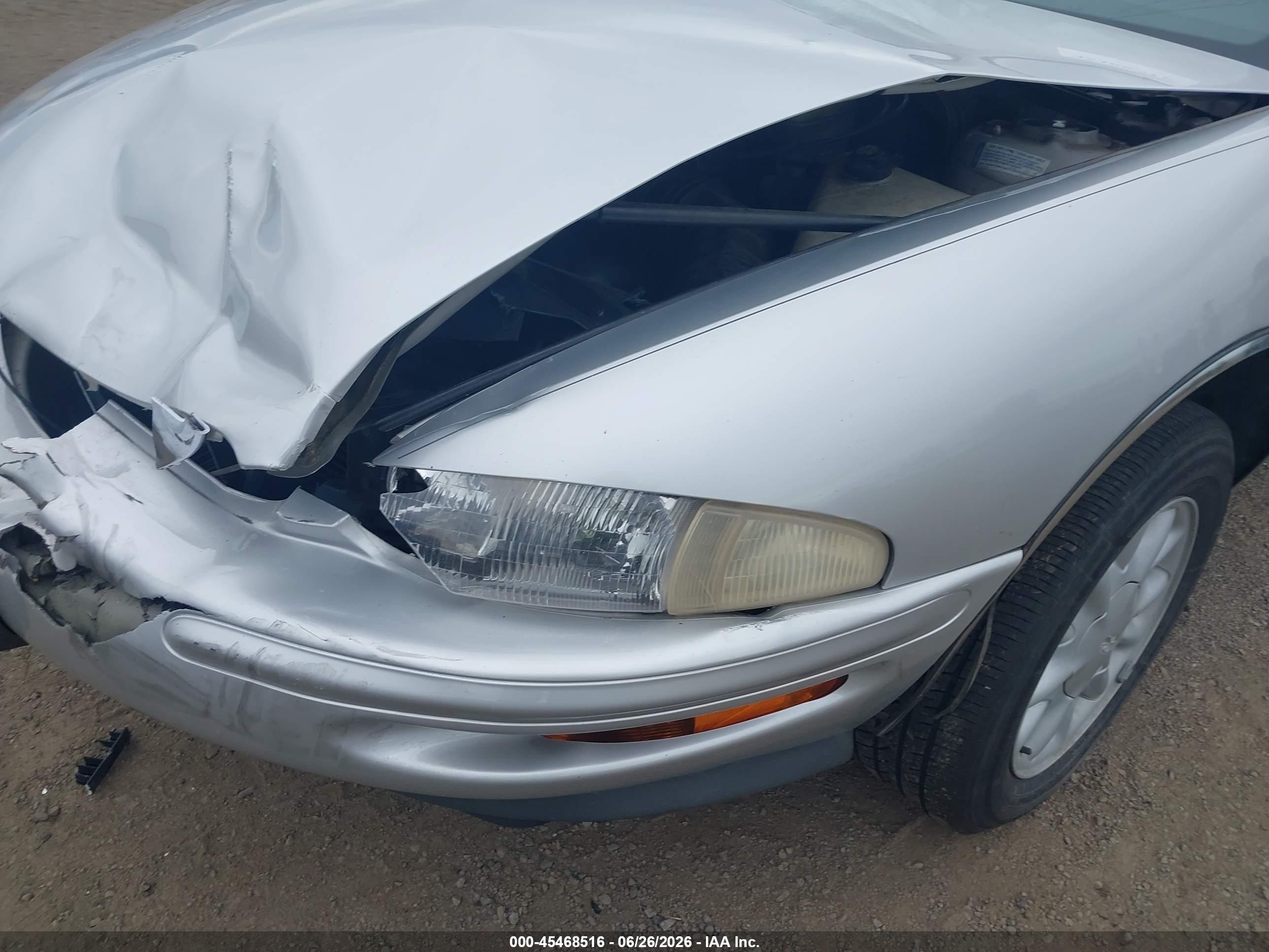 1999 Buick Riviera   Silver vin: 1G4GD2215X4700308