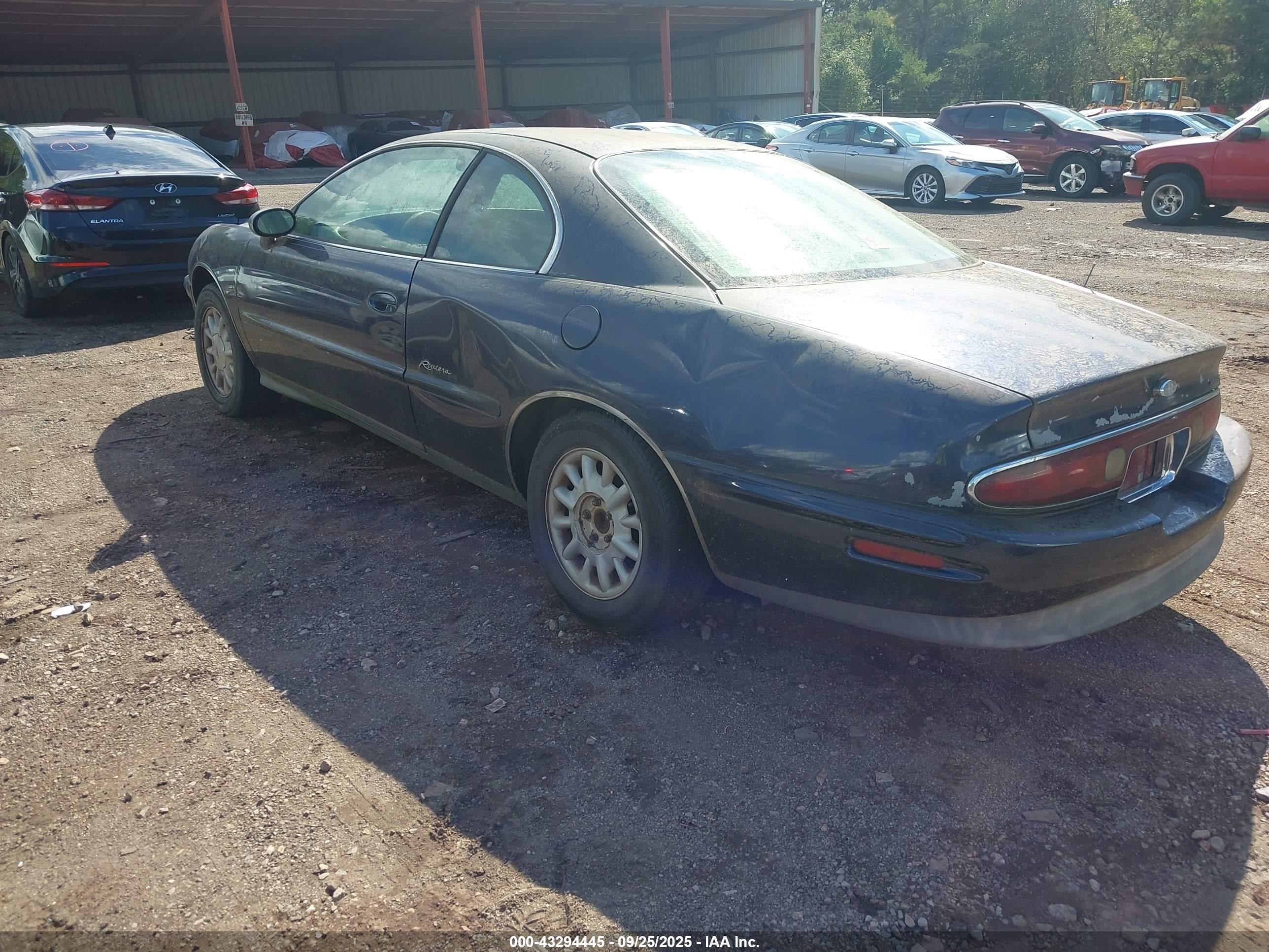 1999 Buick Riviera   Dark Blue vin: 1G4GD2219X4701588