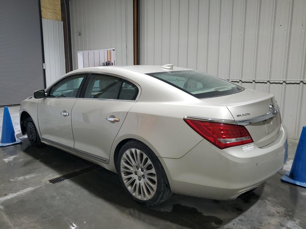 2015 Buick Lacrosse Premium Tan vin: 1G4GF5G31FF149058 Damage: Left Rocker Panel, Dent(S) W/ Paint Dmg, 7 To 8 Inches