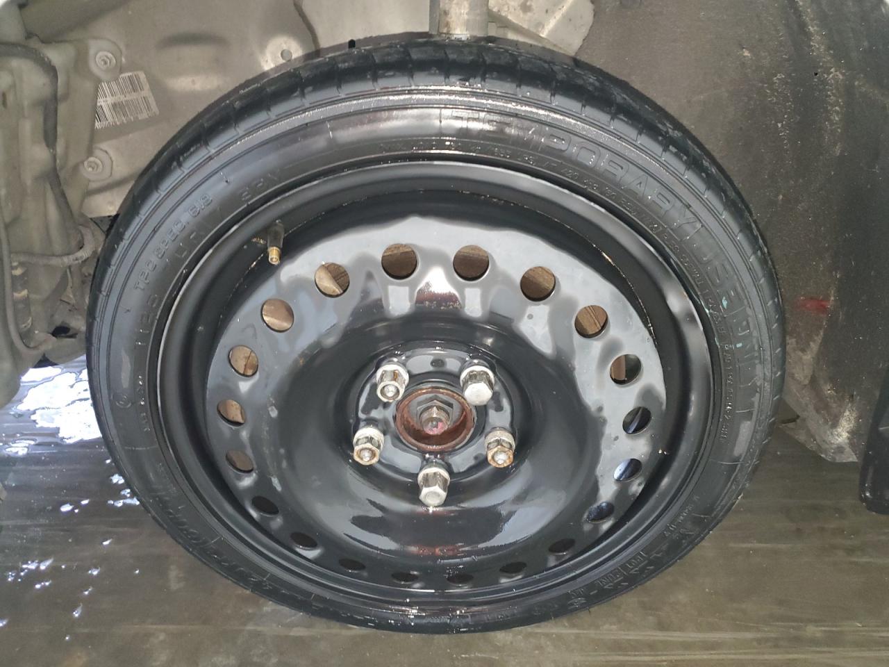 2015 Buick Lacrosse Premium Tan vin: 1G4GF5G31FF149058 Damage: Left Front Wheel, Missing, Replacement Required
