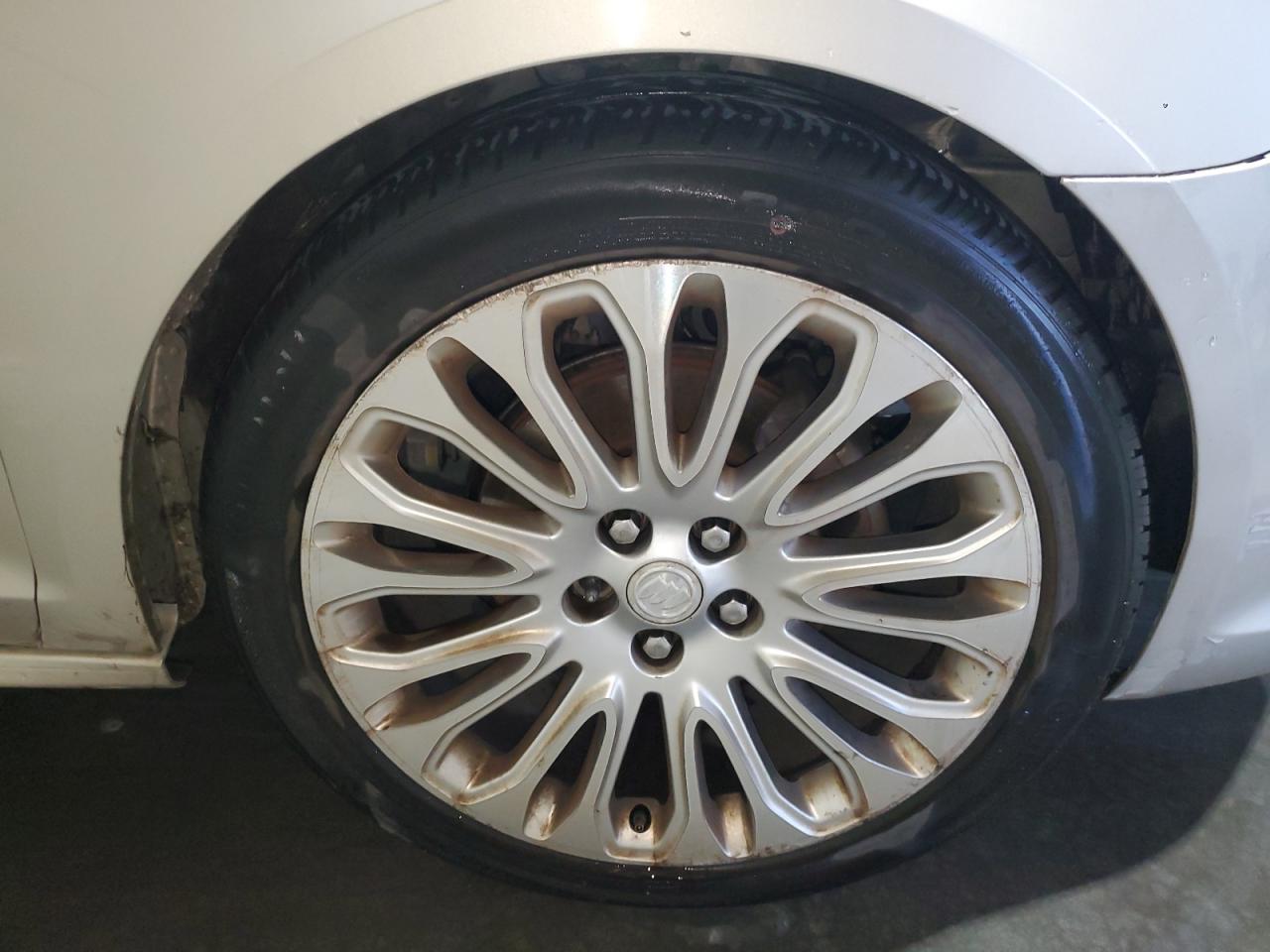 2015 Buick Lacrosse Premium Tan vin: 1G4GF5G31FF149058 Damage: Right Front Wheel, Curb Rash, > 12 Inches