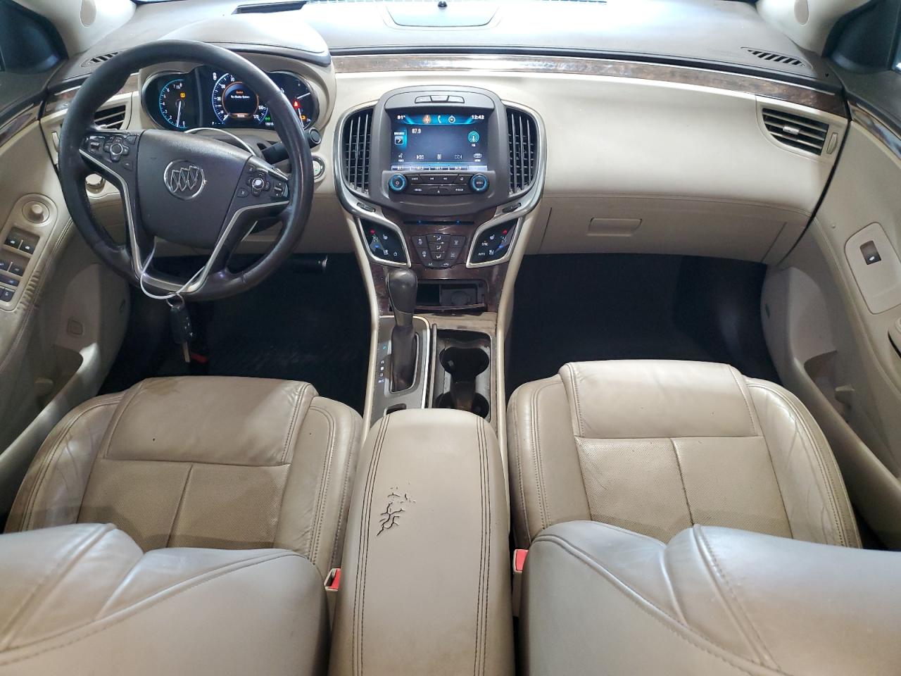 2015 Buick Lacrosse Premium Tan vin: 1G4GF5G31FF149058 Damage: Front Center Armrest, Worn, Replacement Required