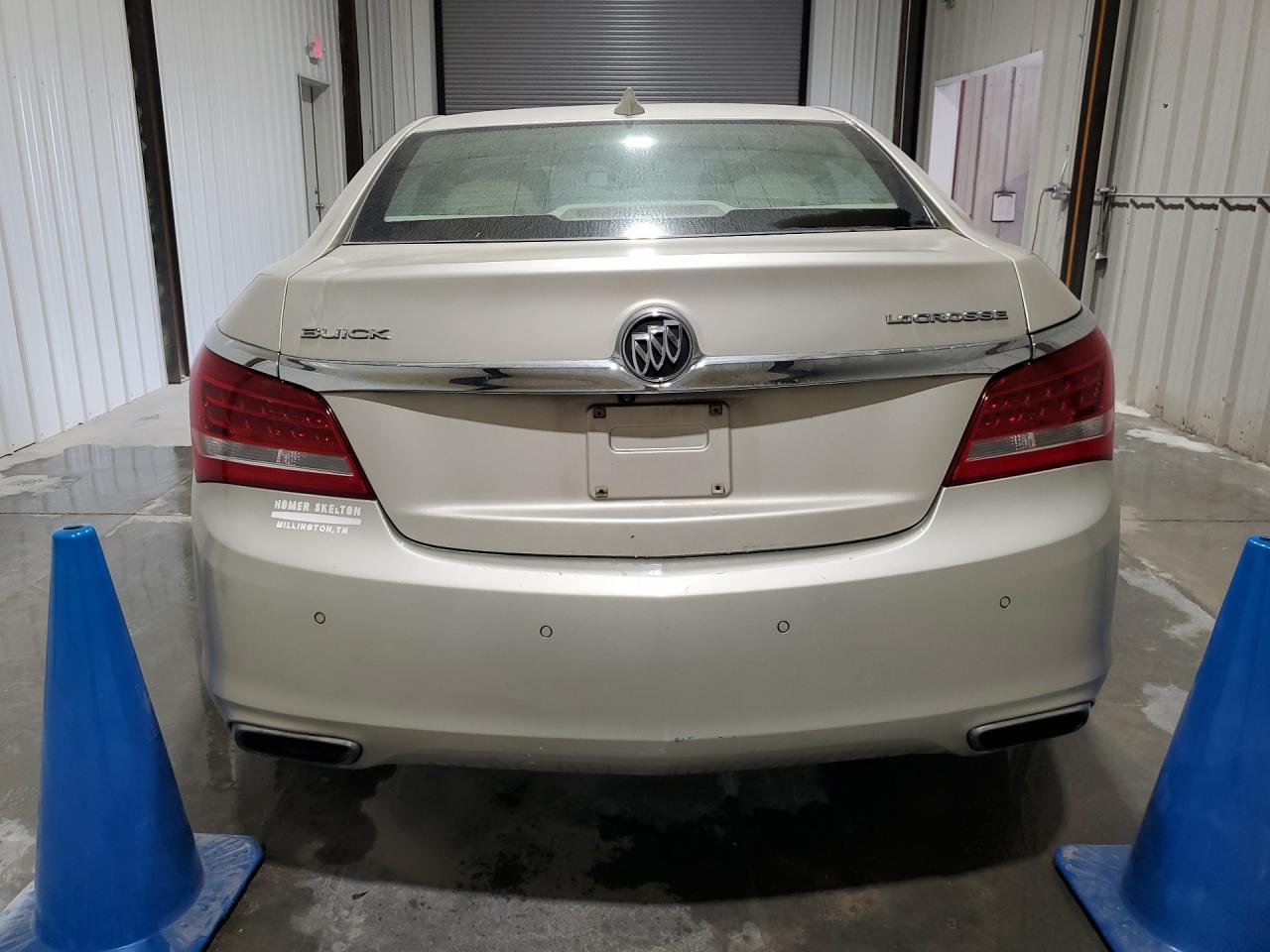 2015 Buick Lacrosse Premium Tan vin: 1G4GF5G31FF149058 Damage: Rear Bumper, Multiple Scratches Heavy, 3