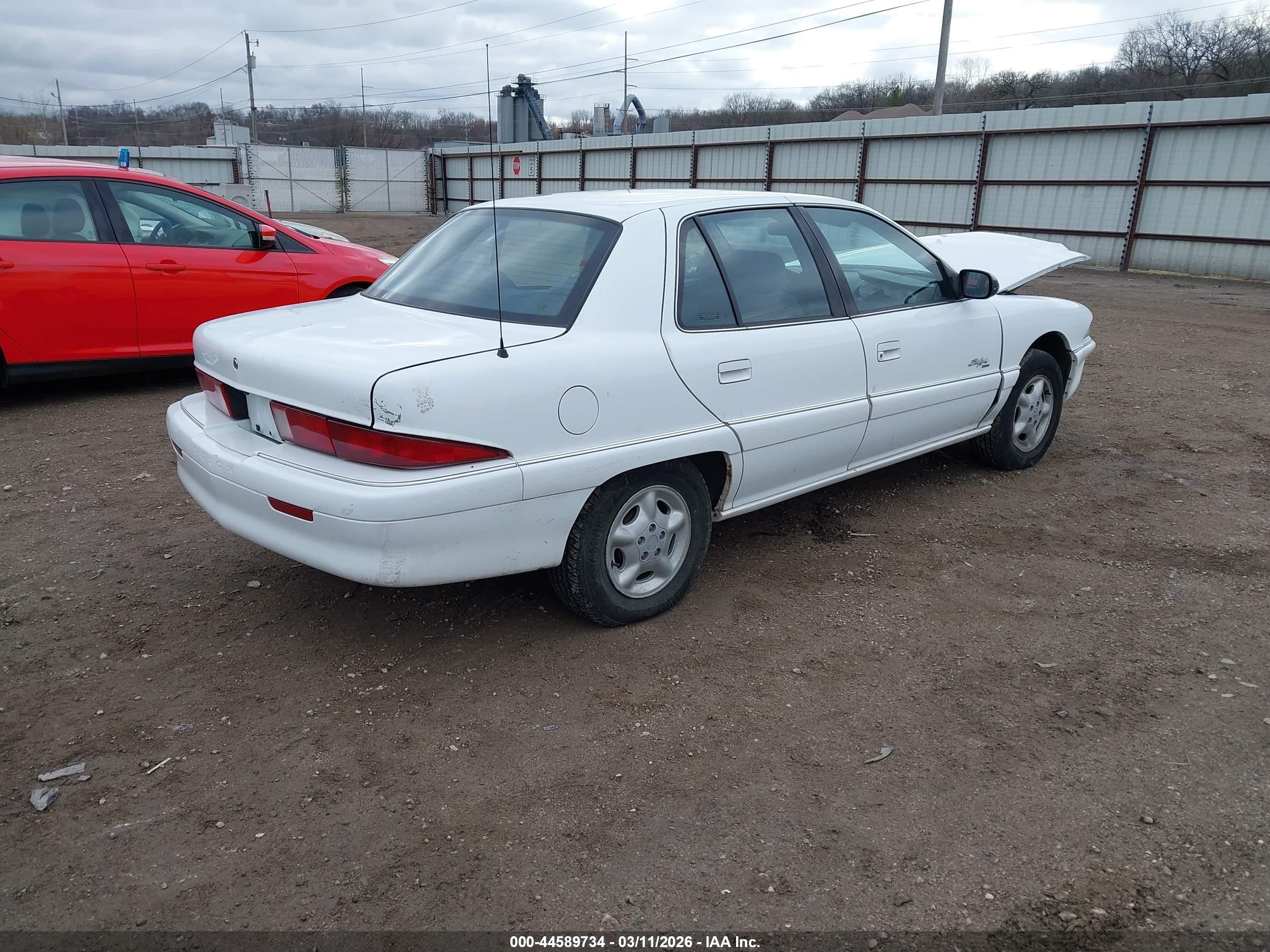 1998 Buick Skylark Custom   White vin: 1G4NJ52M9WC409939