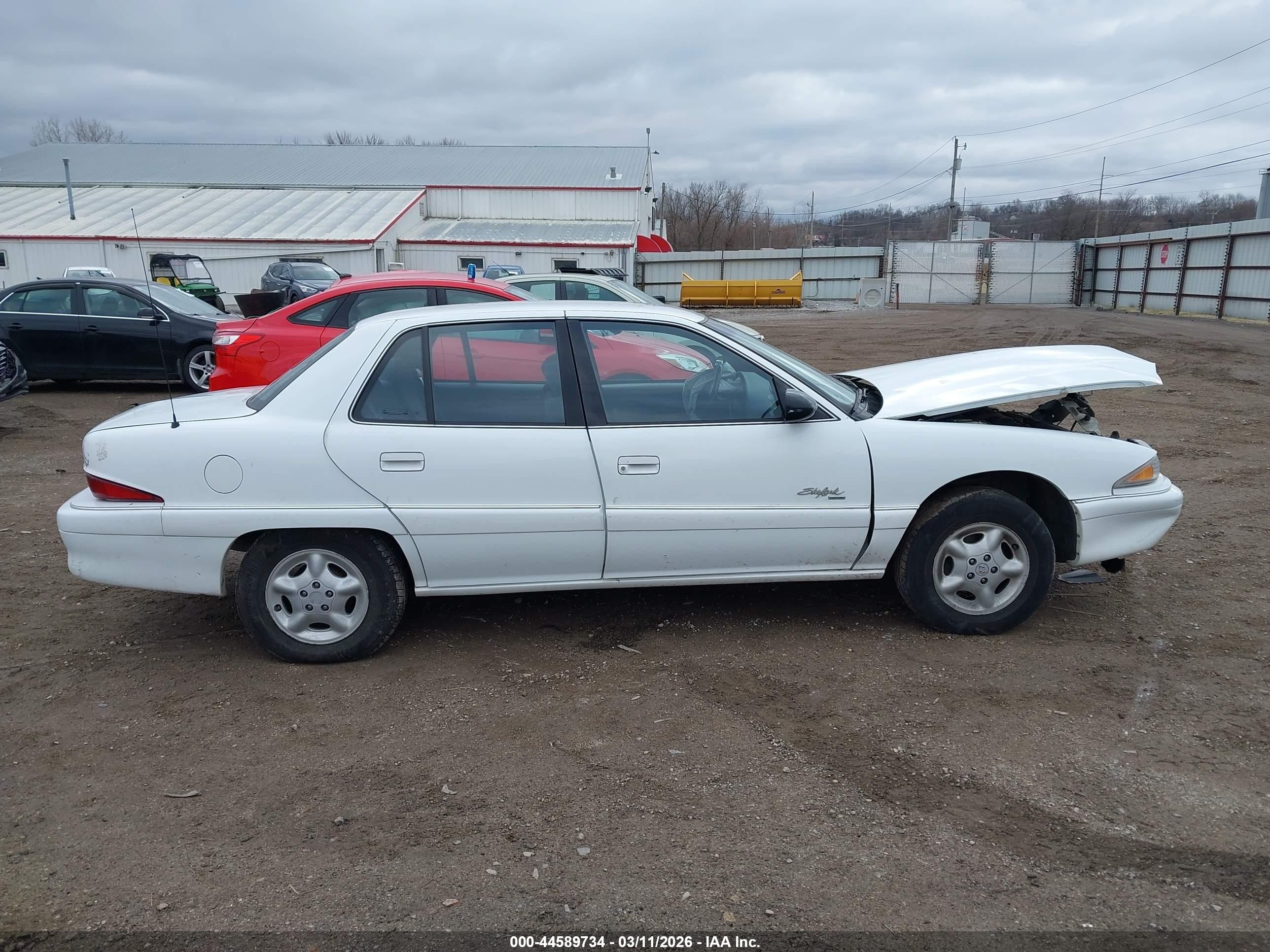 1998 Buick Skylark Custom   White vin: 1G4NJ52M9WC409939