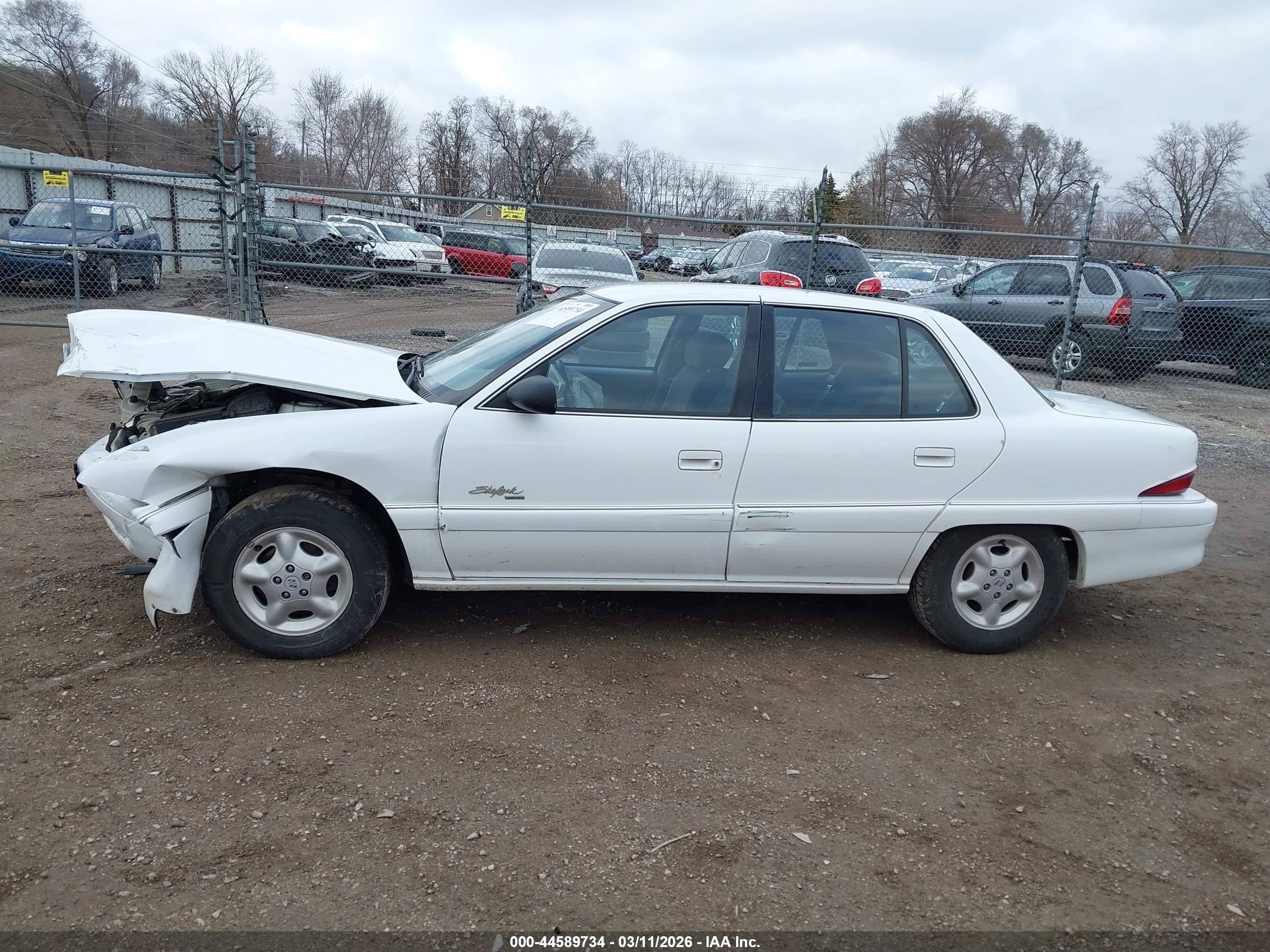 1998 Buick Skylark Custom   White vin: 1G4NJ52M9WC409939