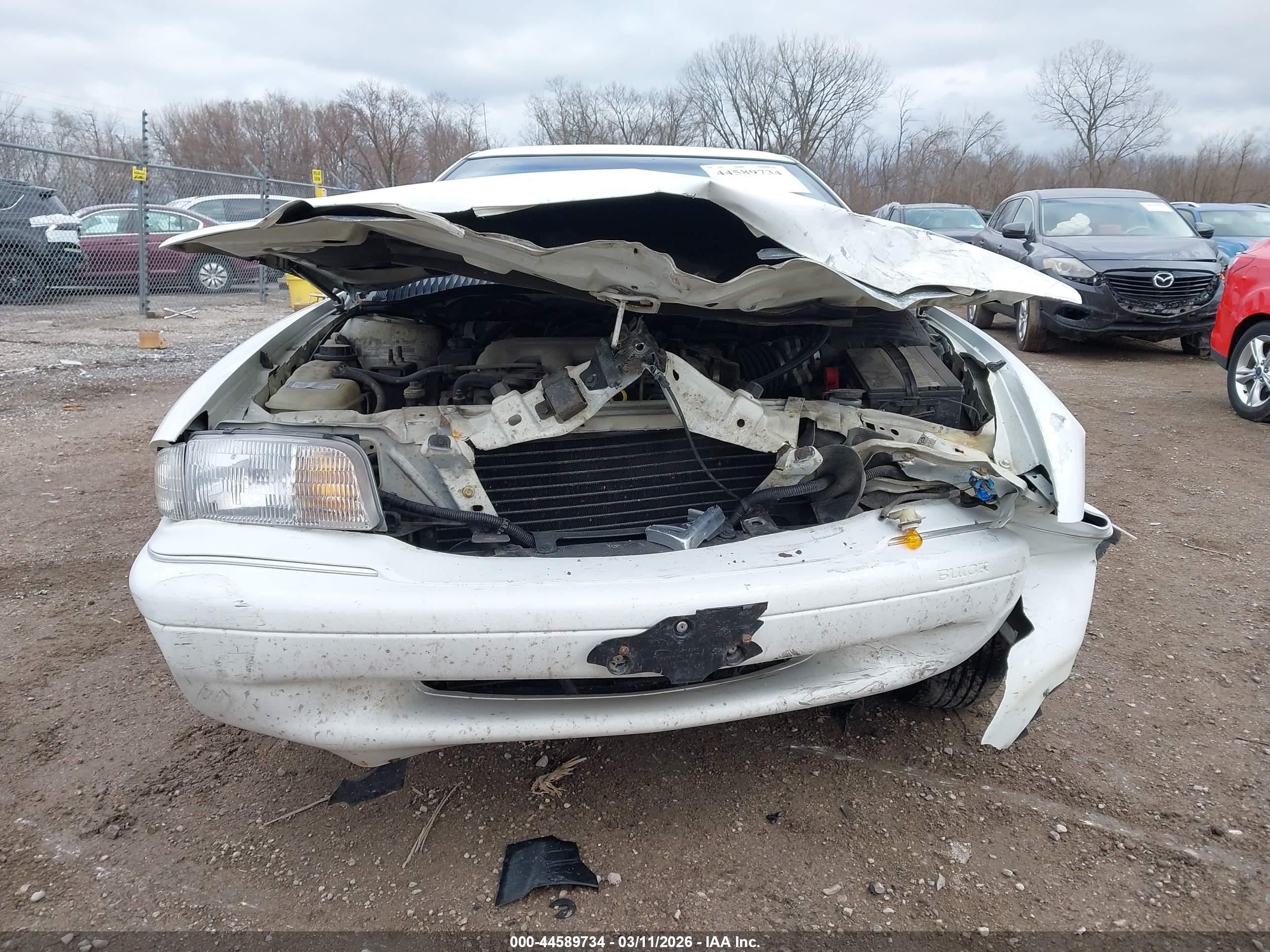 1998 Buick Skylark Custom   White vin: 1G4NJ52M9WC409939