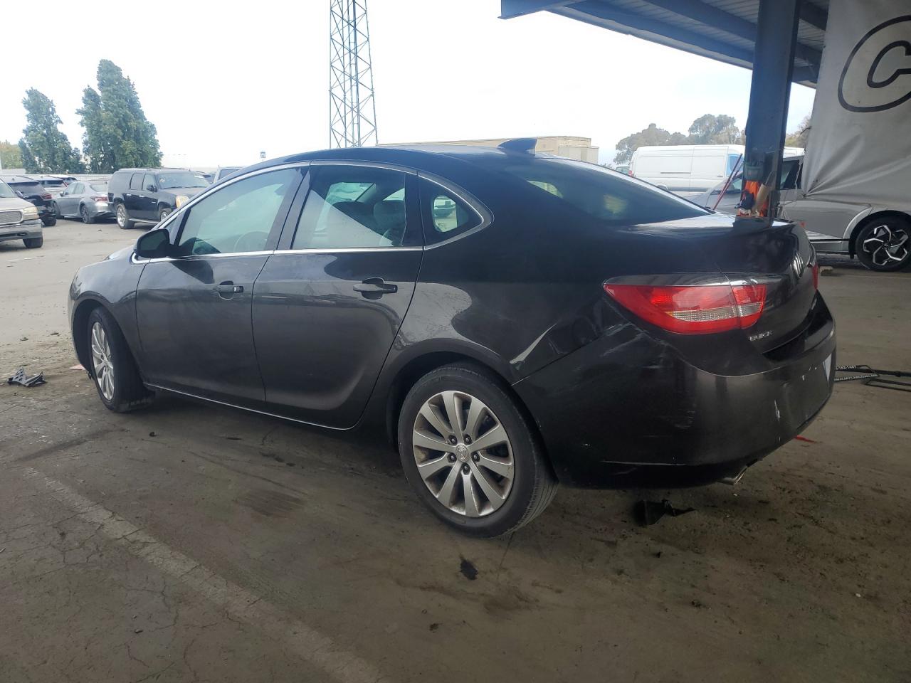 2015 Buick Verano Brown vin: 1G4PP5SK0F4170975 Damage: Left Rear Door, Dent(S) W/No Paint Dmg, < 1/8 Inch