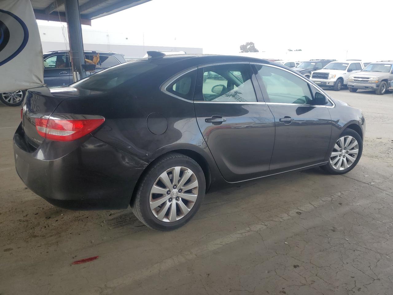 2015 Buick Verano Brown vin: 1G4PP5SK0F4170975 Damage: Right Qtr Panel, Dent(S) W/ Paint Dmg, 7 To 8 Inches