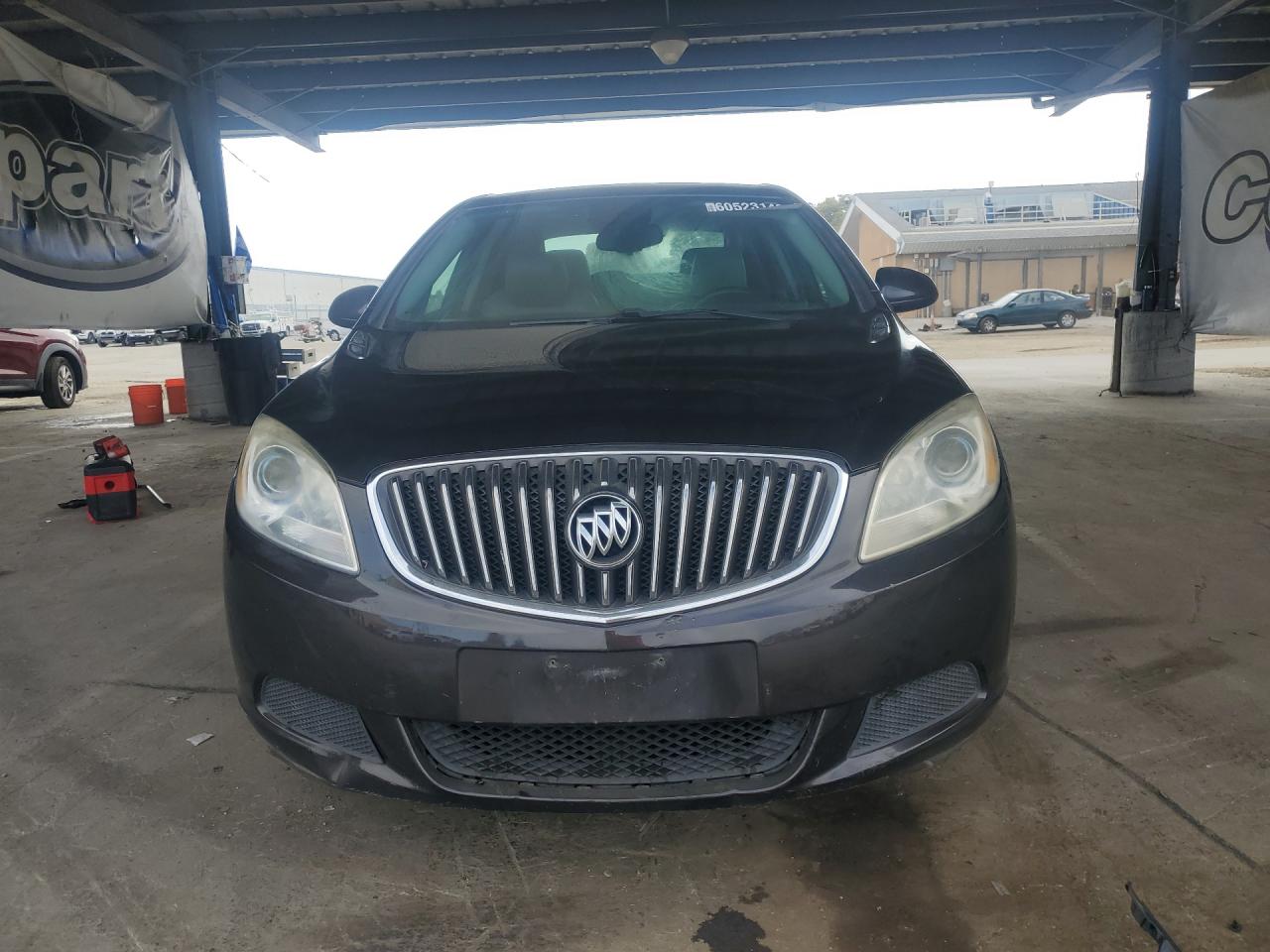 2015 Buick Verano Brown vin: 1G4PP5SK0F4170975 Damage: Left Head Lamp, Faded, Repair Required
