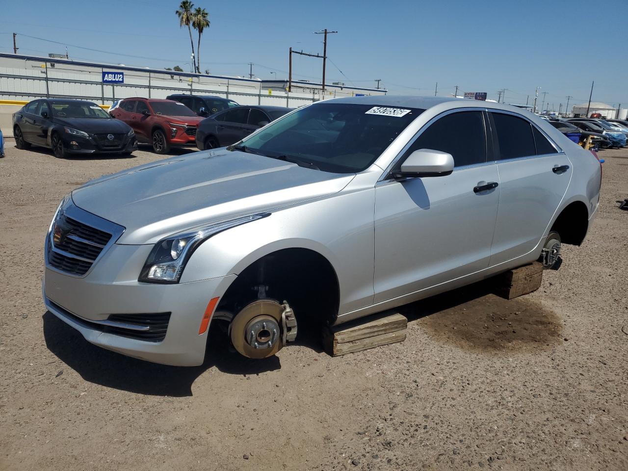 2015 Cadillac Ats Silver vin: 1G6AA5RA7F0132548 Damage: Left Front Wheel, Missing, Replacement Required