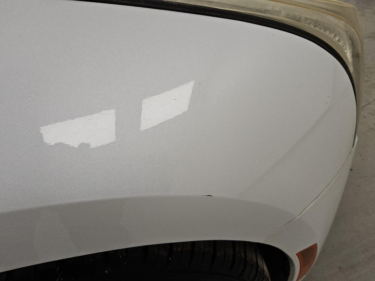 2015 Cadillac Ats Performance White vin: 1G6AC1R37F0125703 Damage: Right Front Fender, Light Scratch, 1/2 To 1 Inch