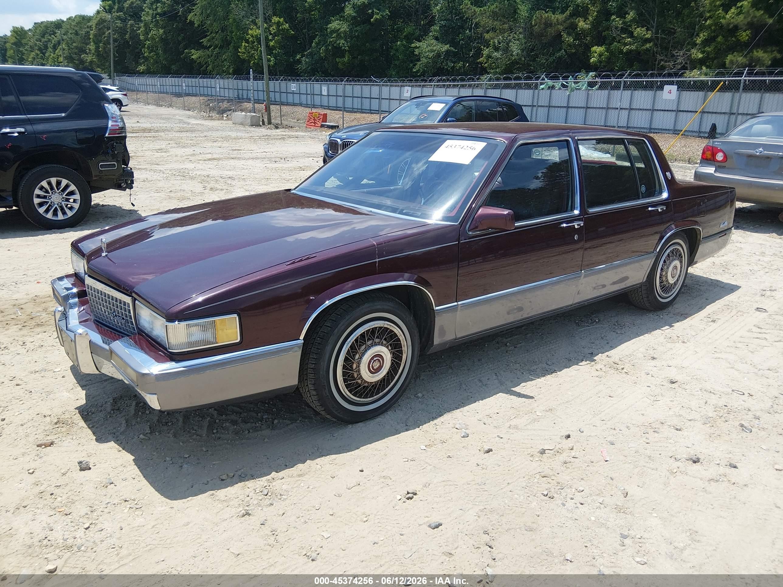 1990 Cadillac Deville   Бордовый vin: 1G6CD5330L4312775